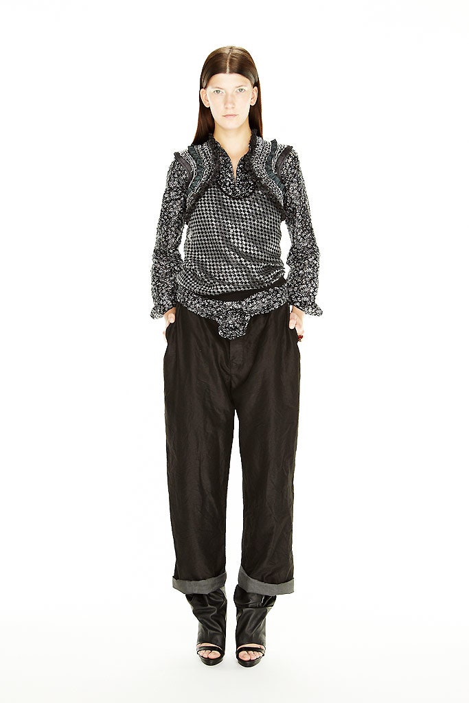 black and white ruffled top with relaxed pants