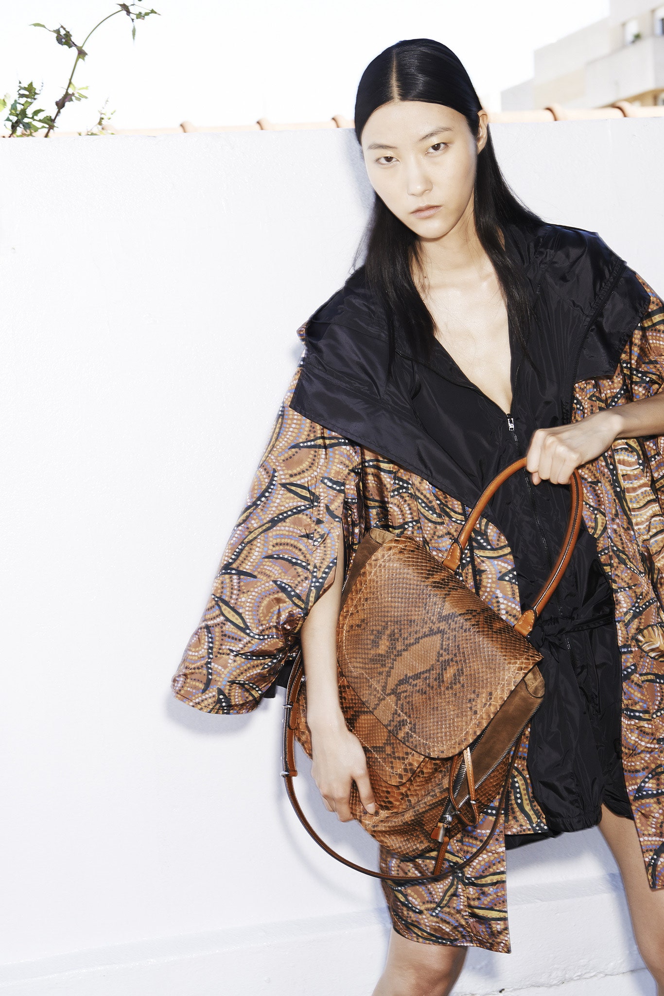 black and brown printed coat