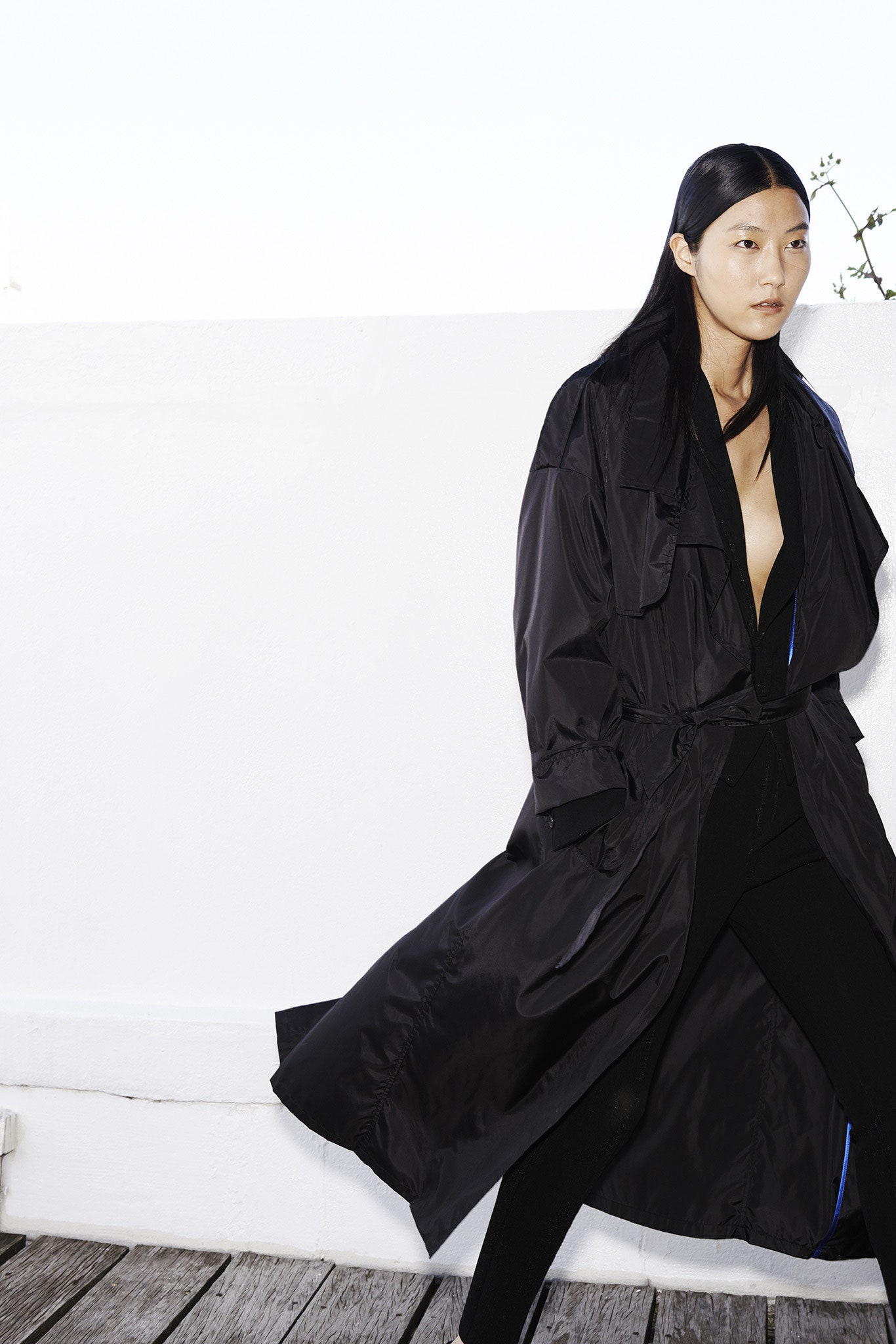 black vinyl trench and catsuit