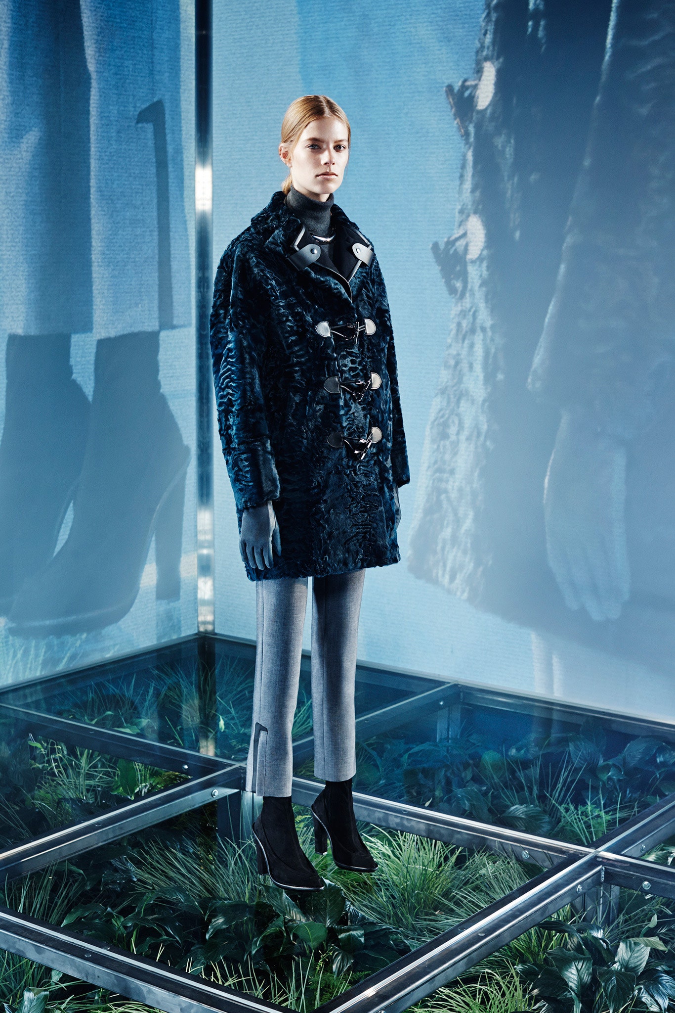 blue fur coat with tailored gray pants