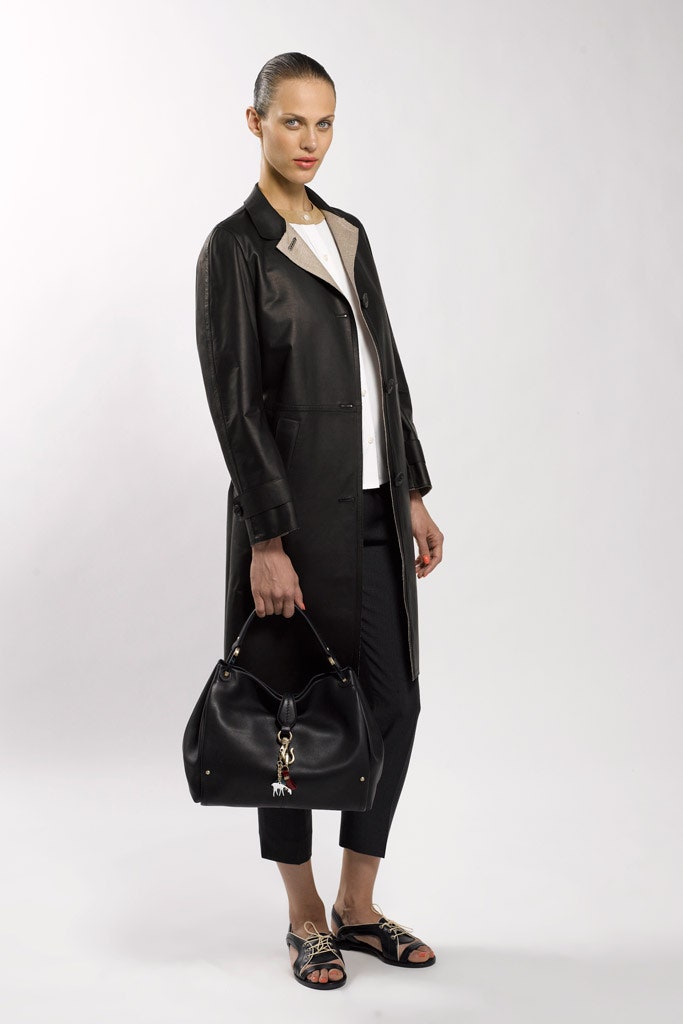 black leather coat with white blouse