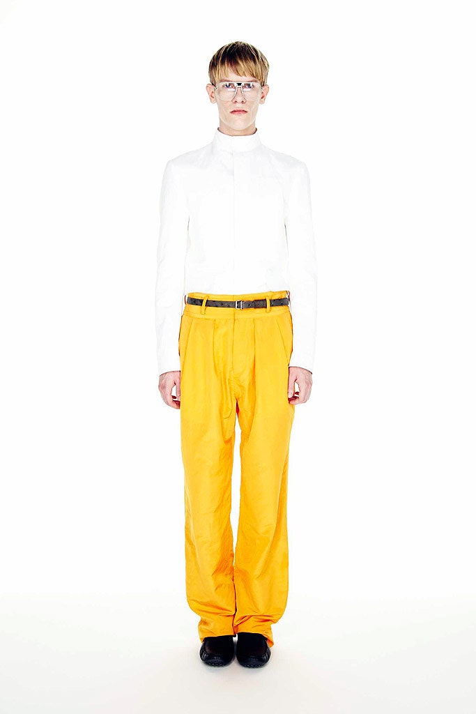 white fitted shirt and orange pants