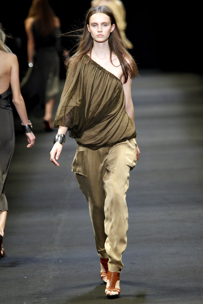brown draped top with cargo pants