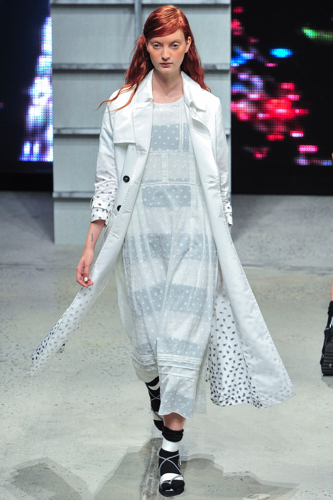 white silk long-sleeve collared relaxed buttoned coat
