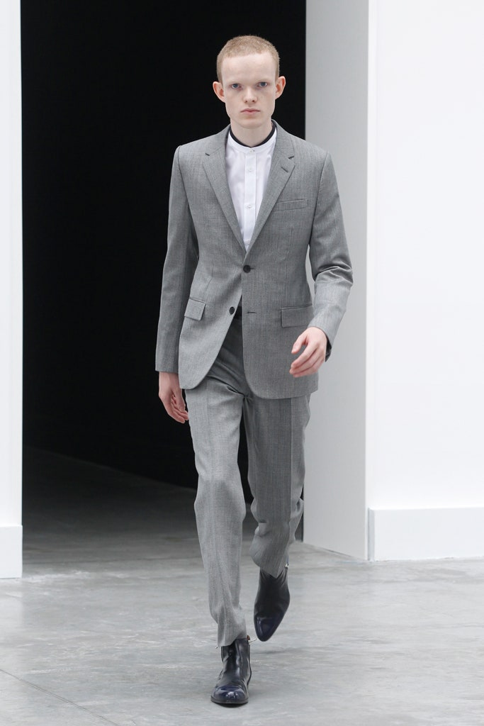 gray tailored suit with white shirt