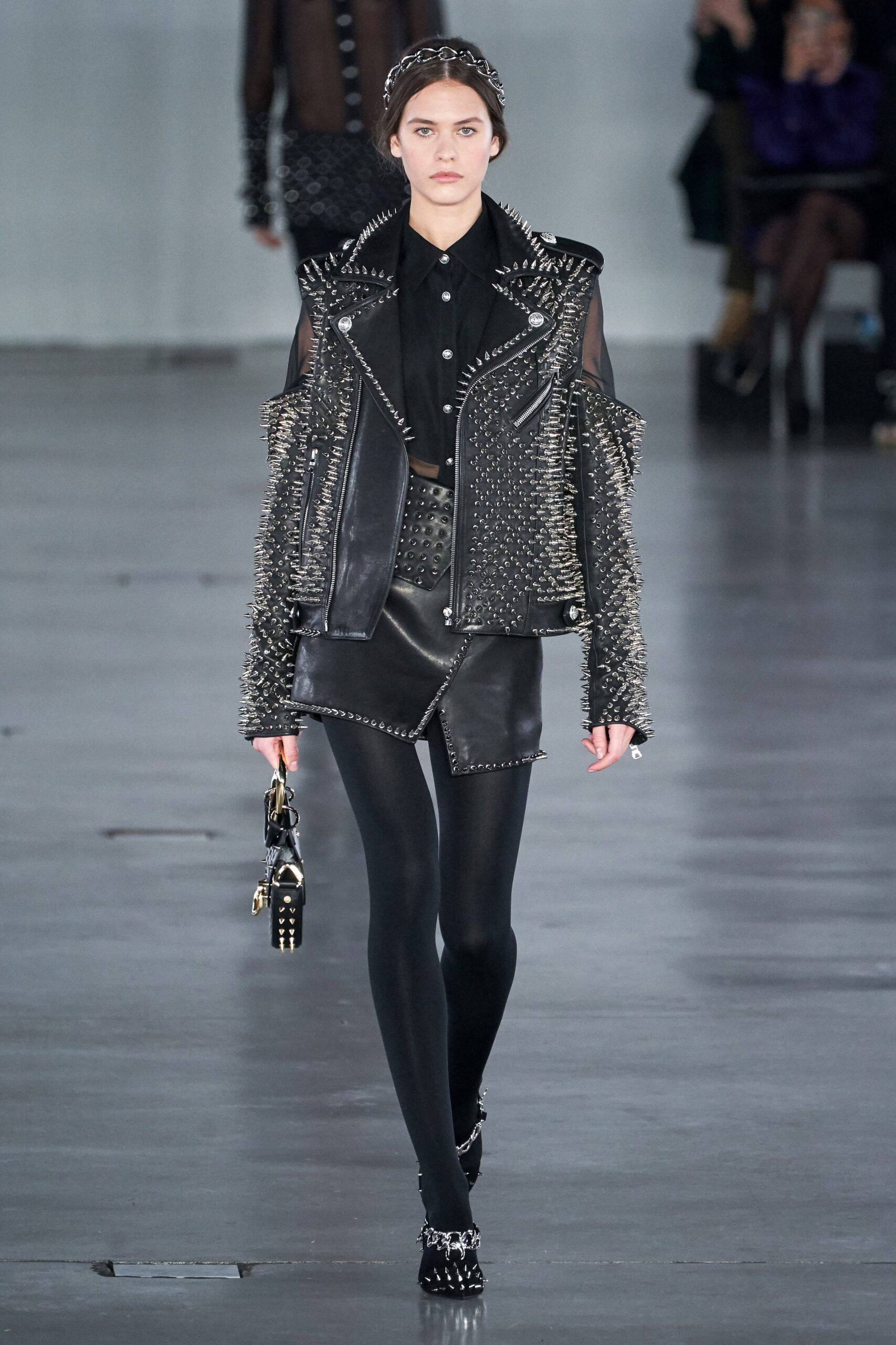 black leather spiked jacket and shorts