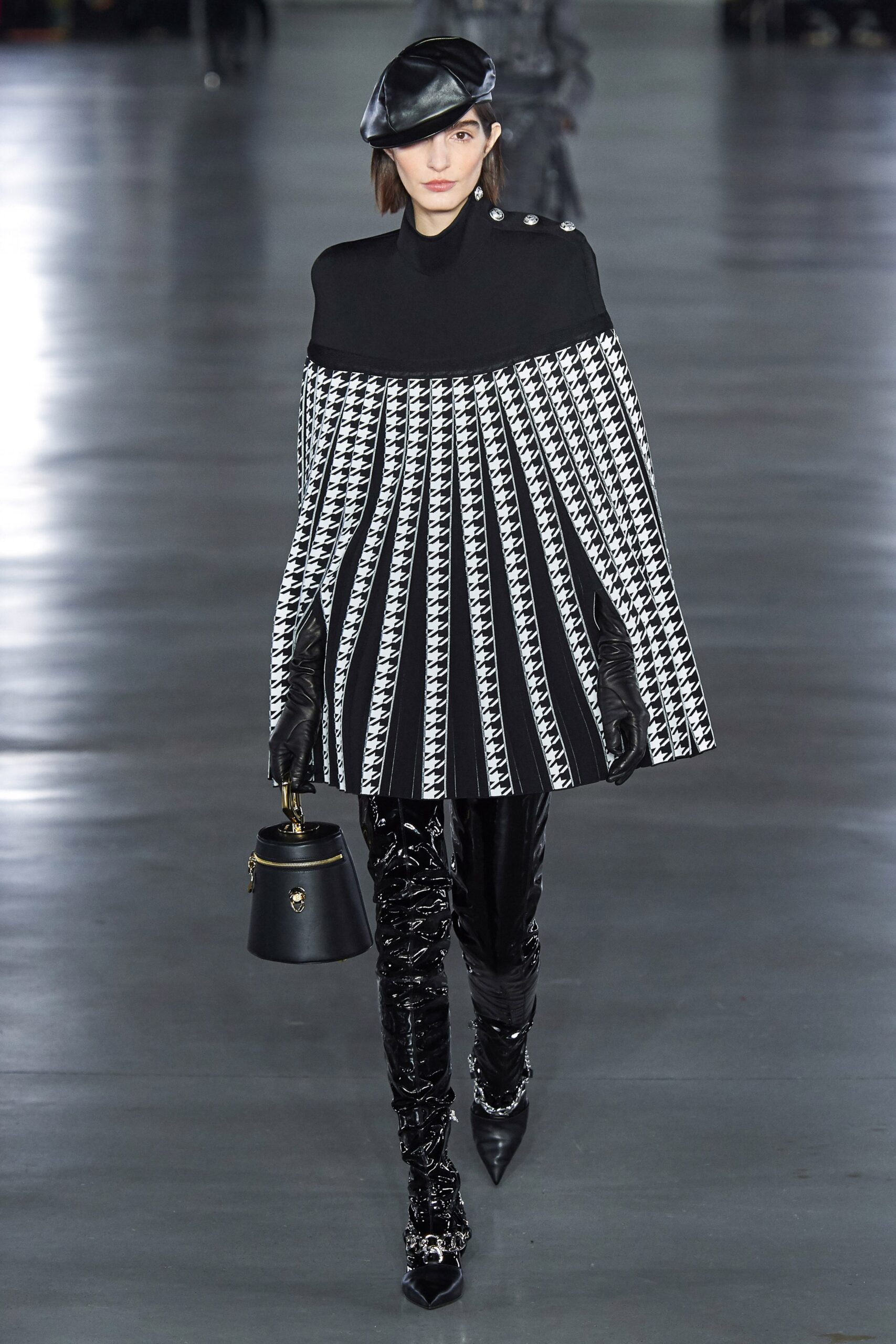 black and white pleated cape