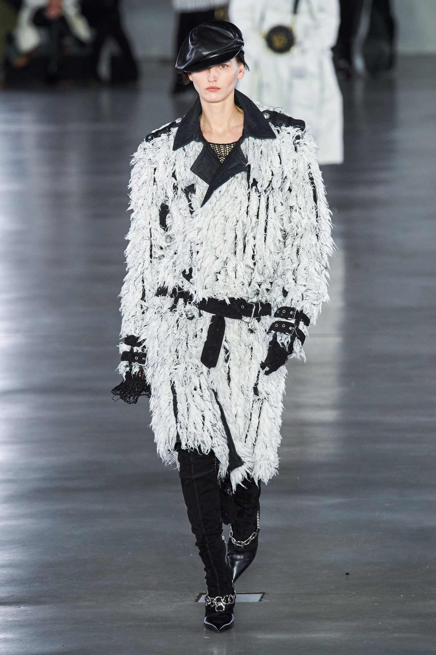 oversized black and white fringed coat