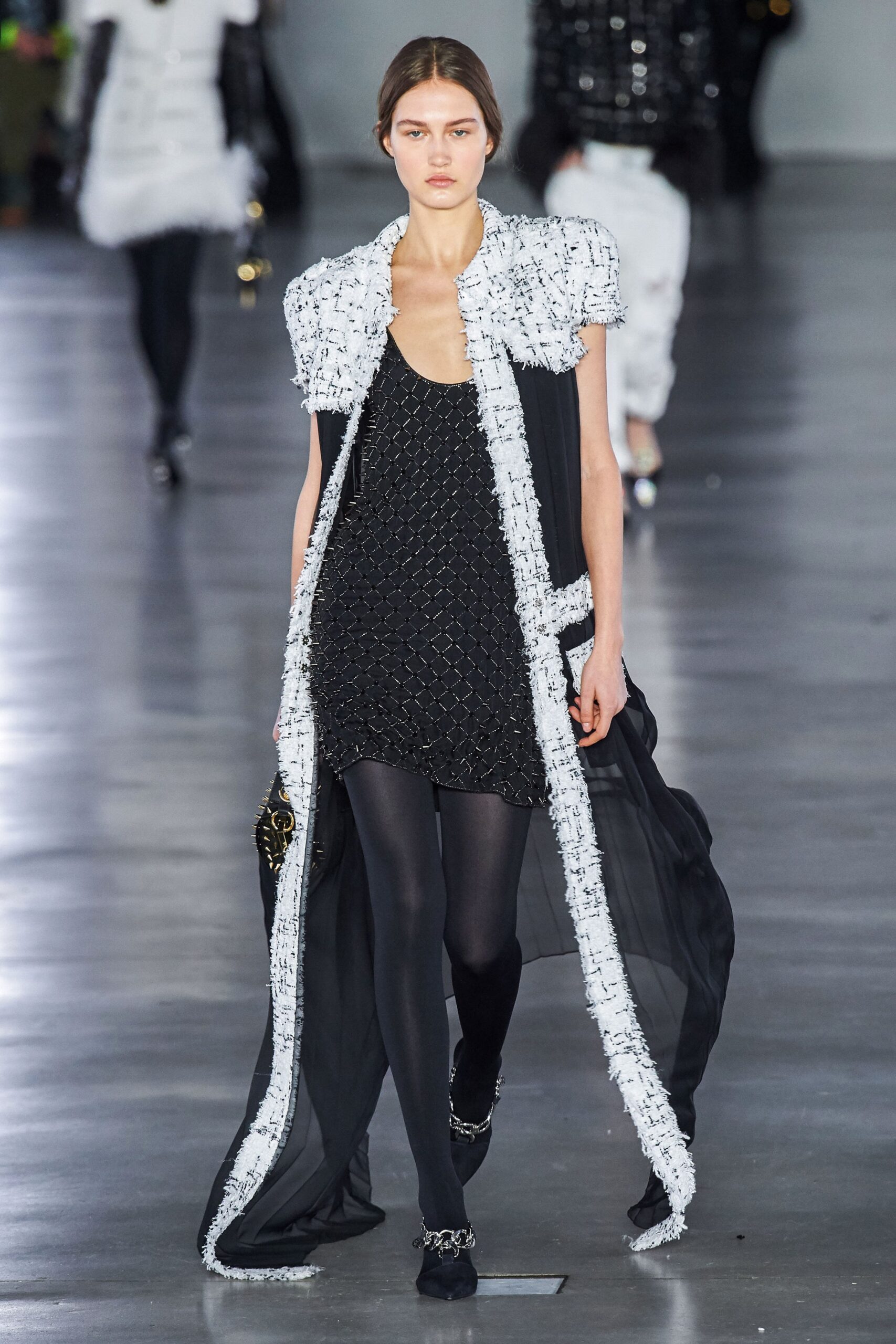 black silk mini dress with layered coat