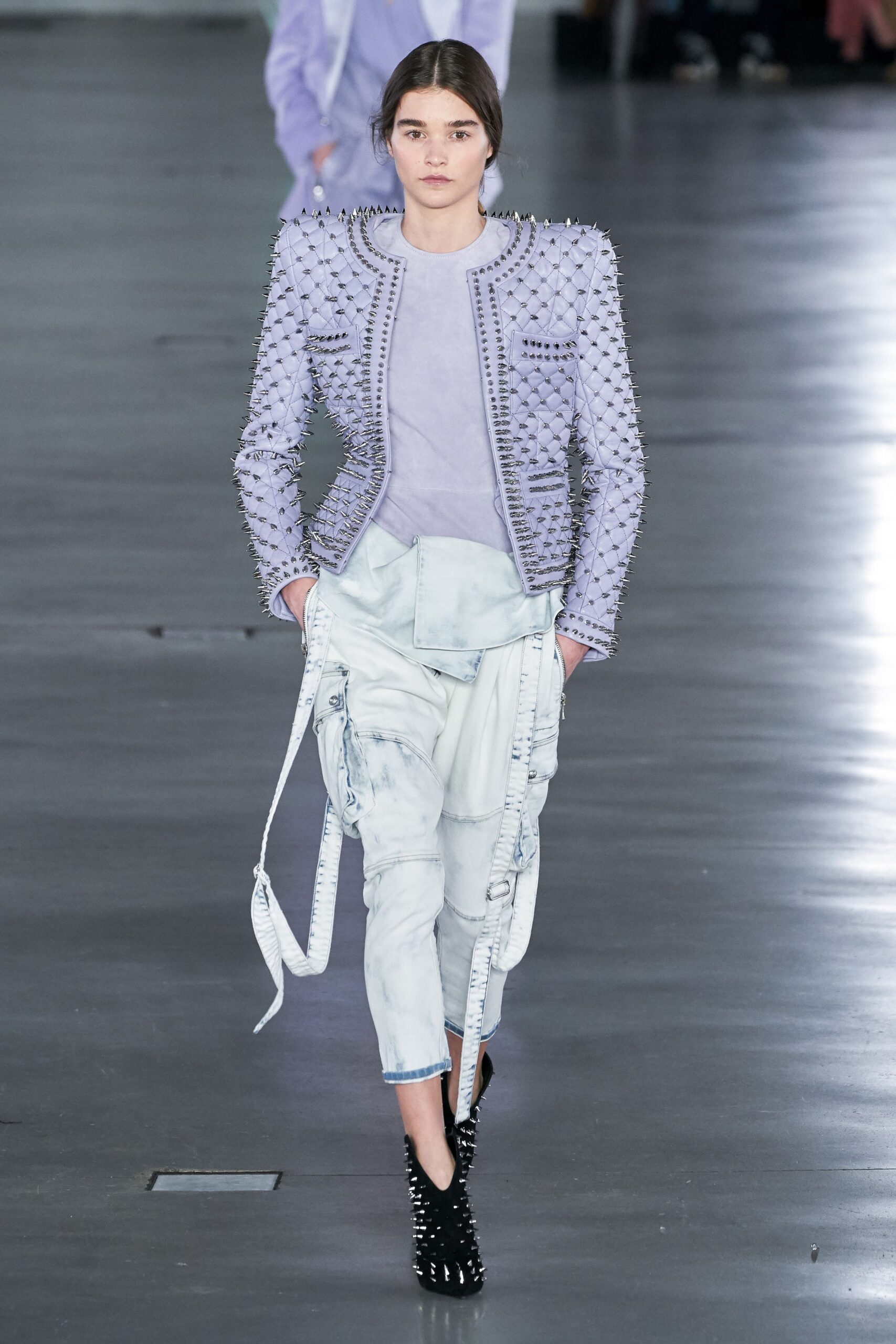 fitted purple spiked jacket and relaxed white cargo pants