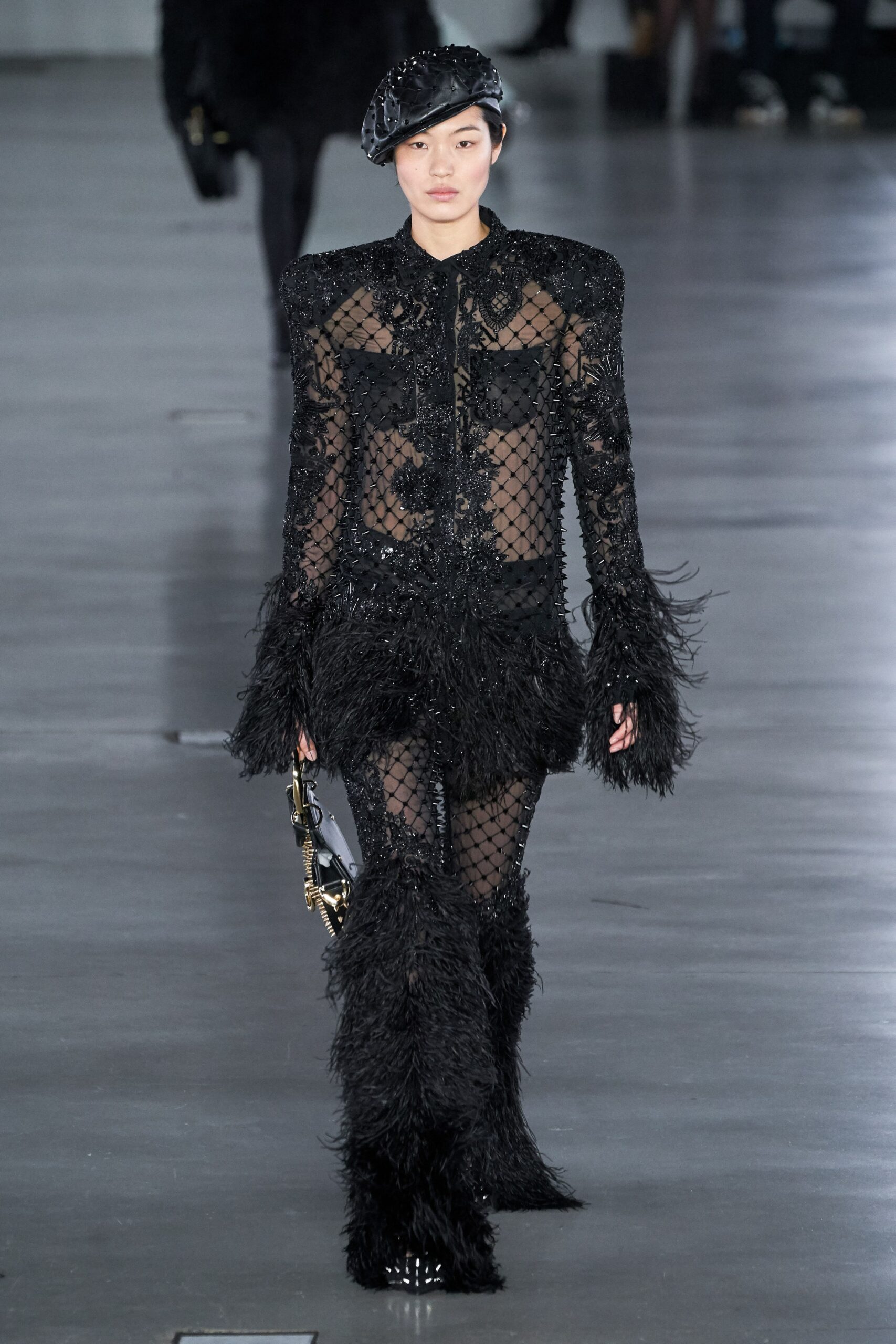 black feathered jacket and pants