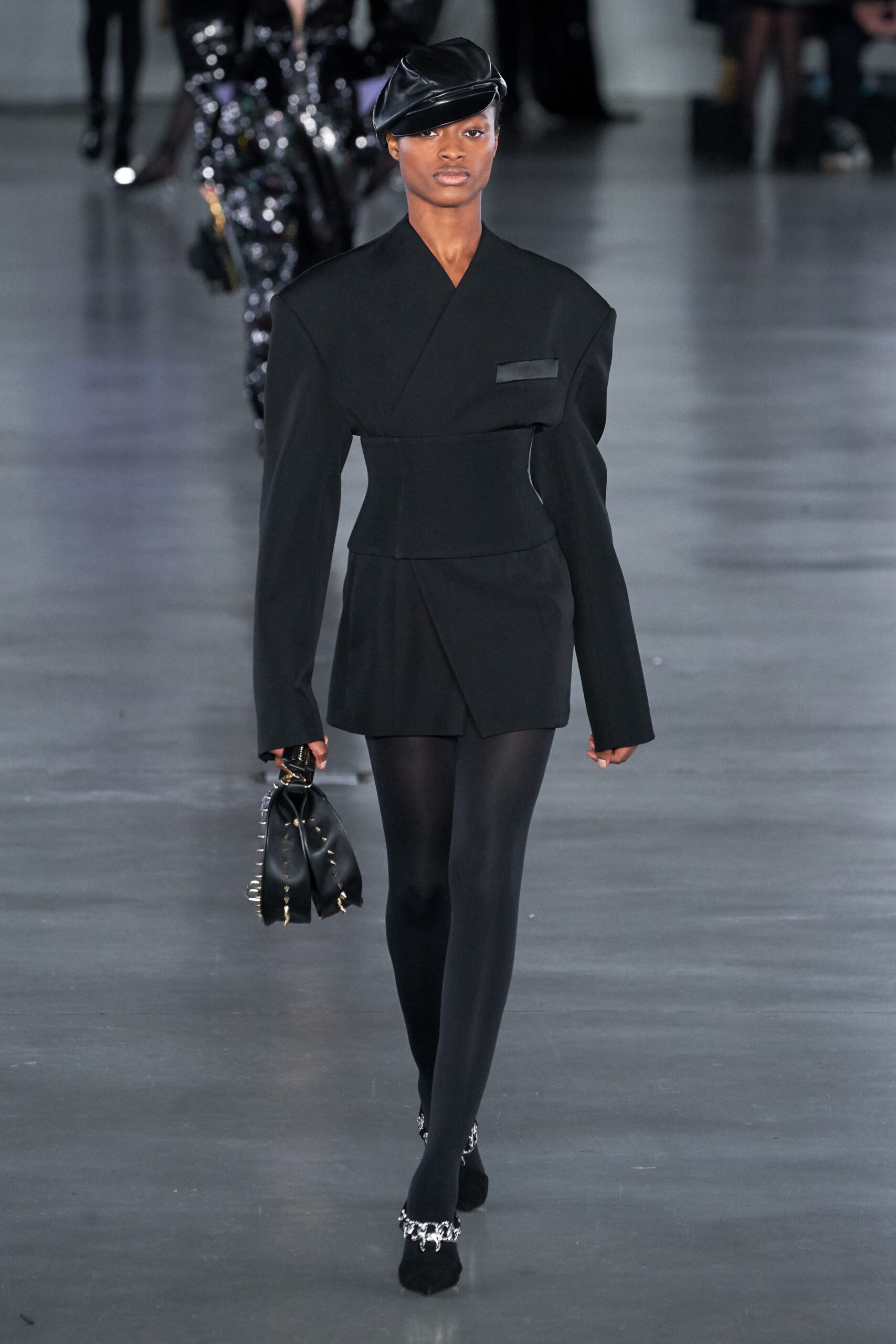 black tailored blazer with fitted pants