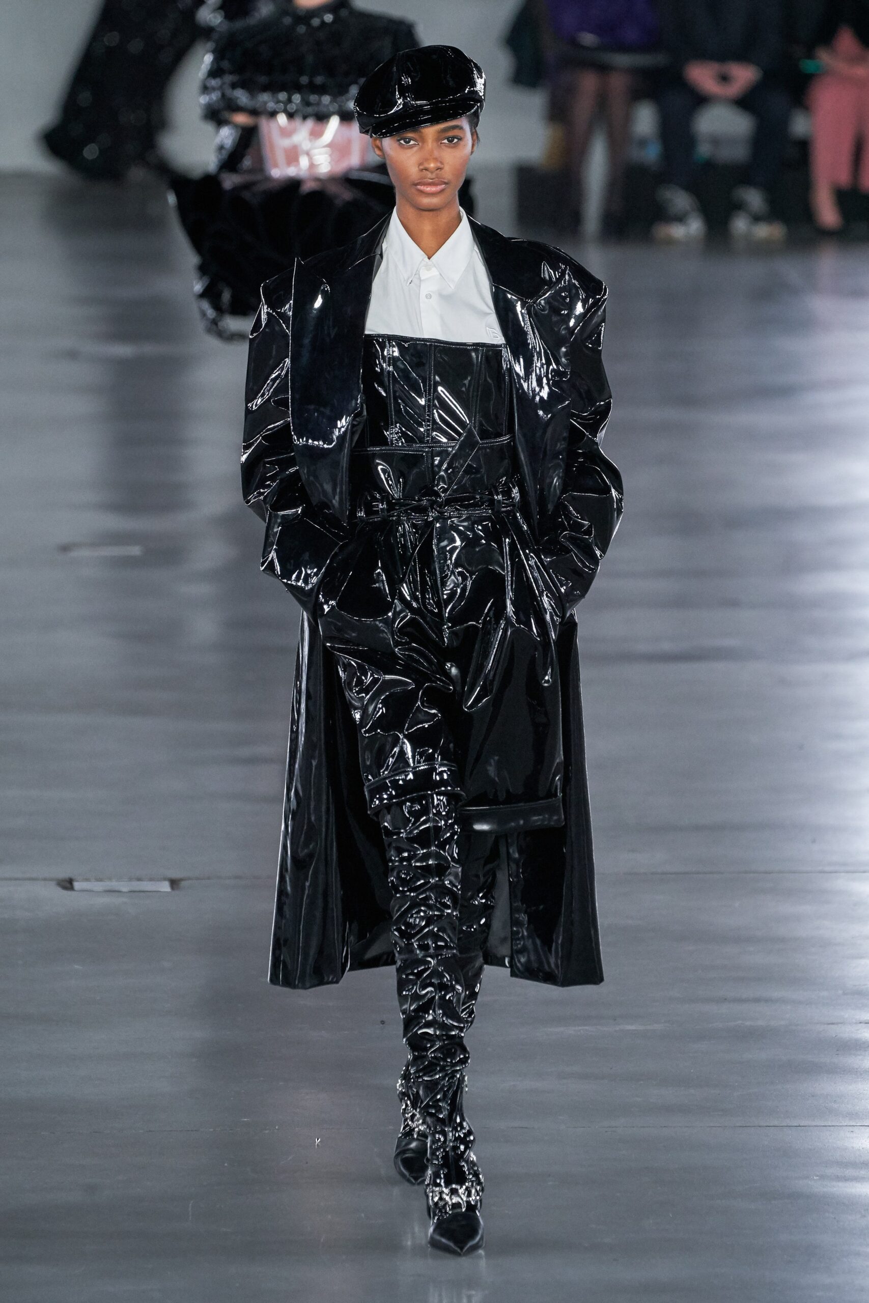 black vinyl coat and dress