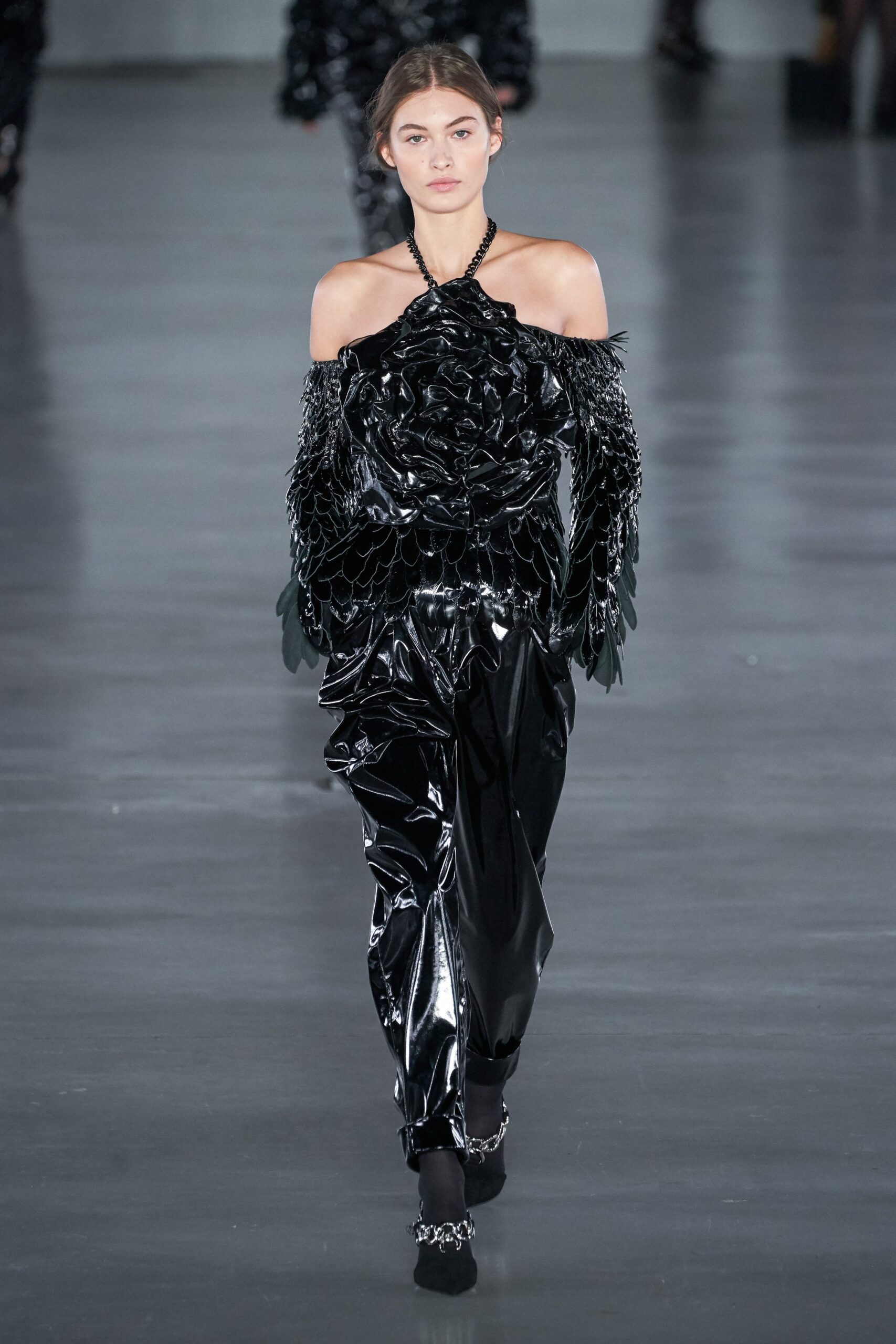 black vinyl off-shoulder top and pants