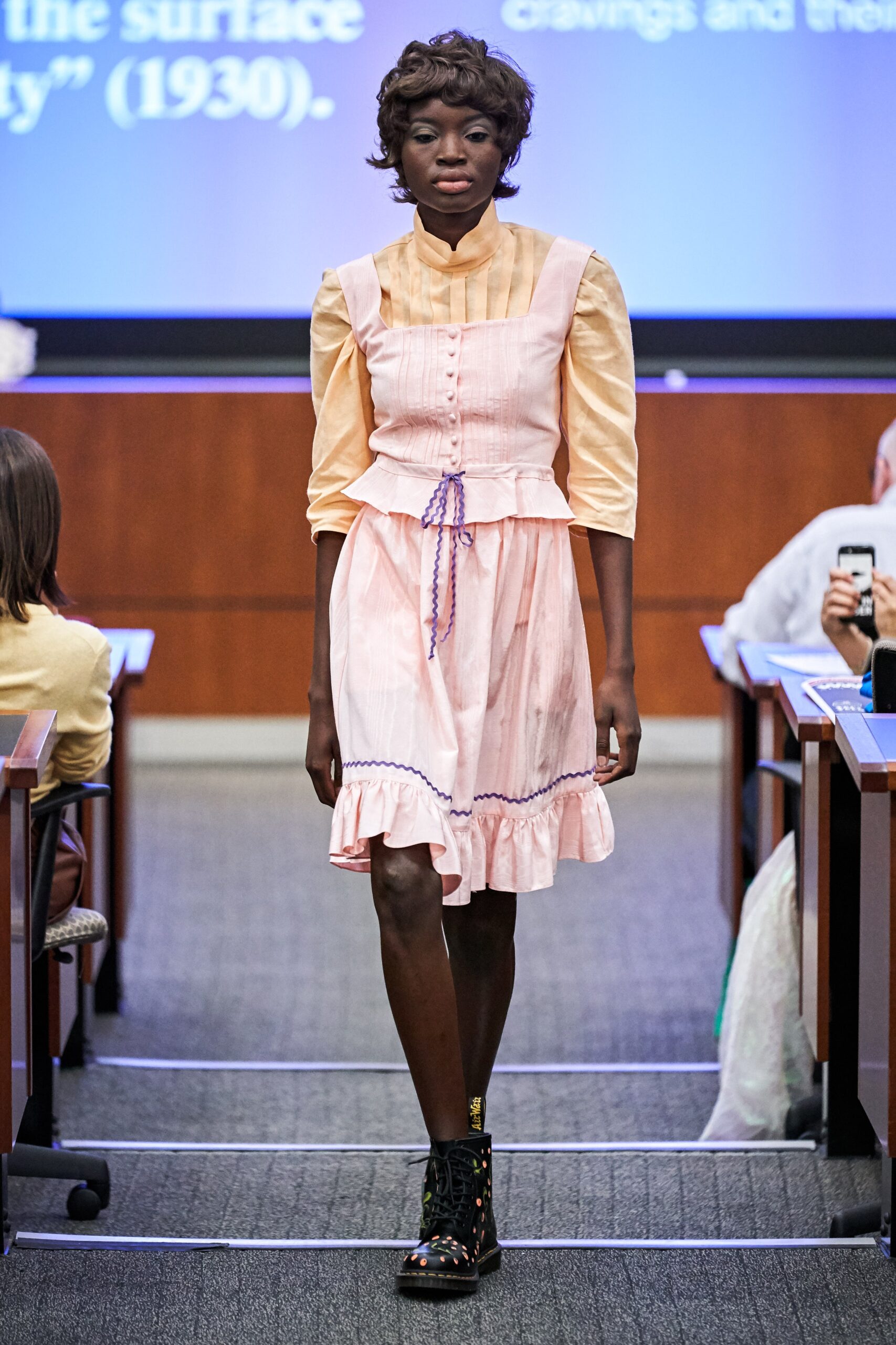 pink fitted mini dress with long sleeves