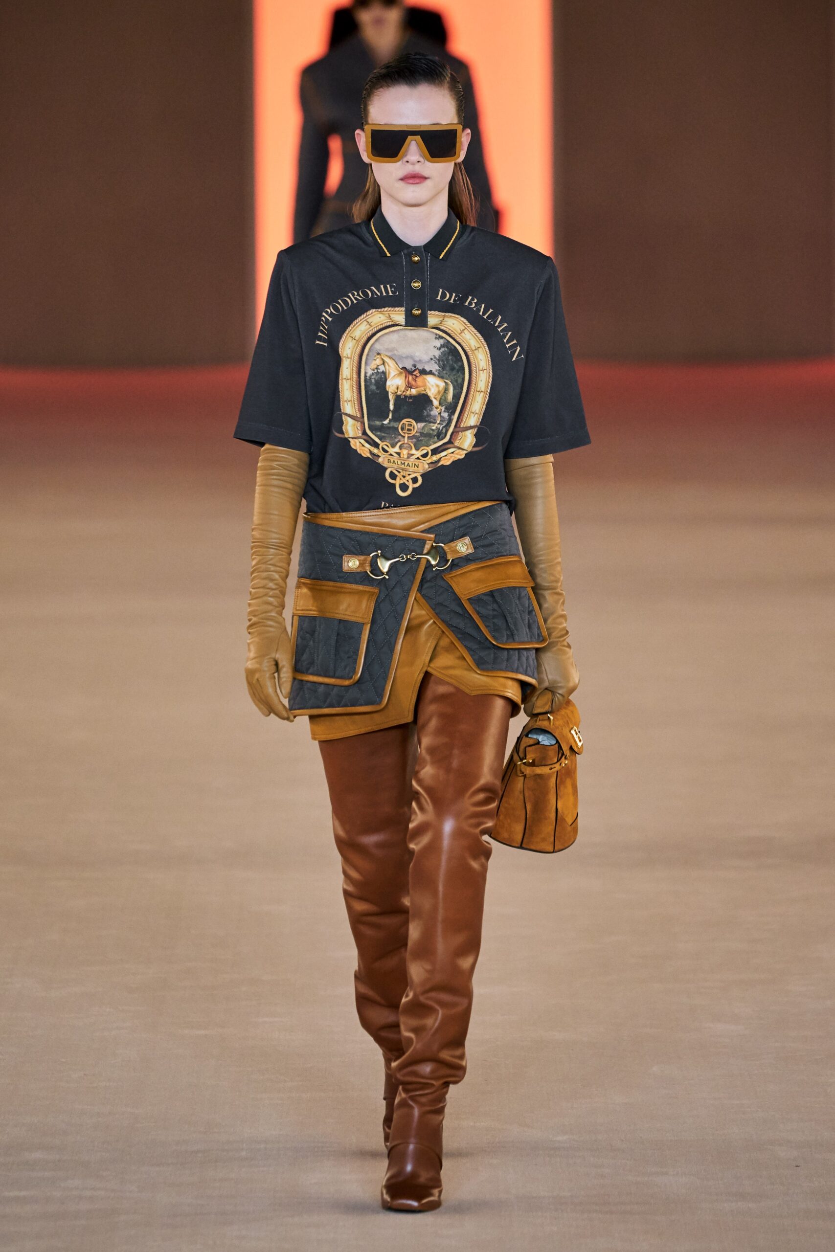 black cotton collared top with brown leather pants