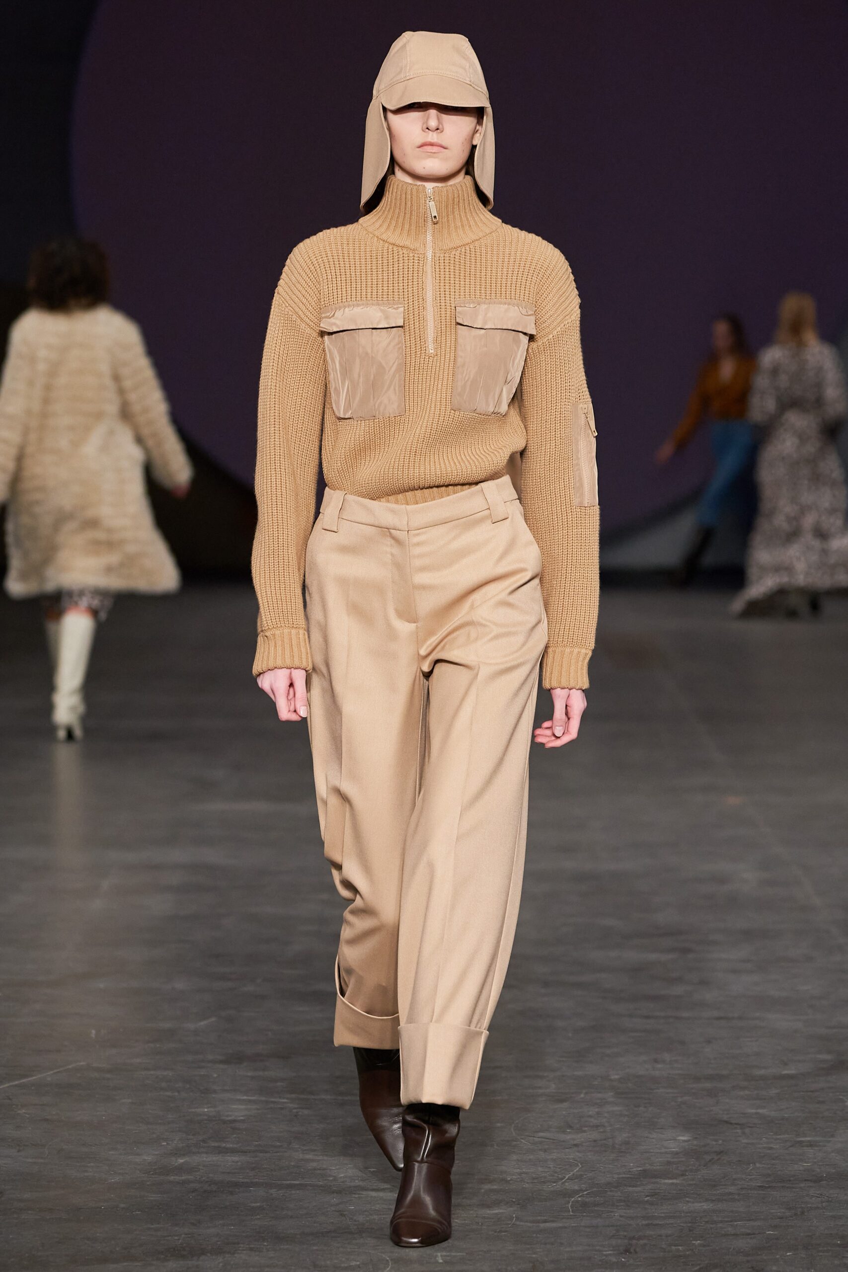 beige fitted sweater and relaxed pants
