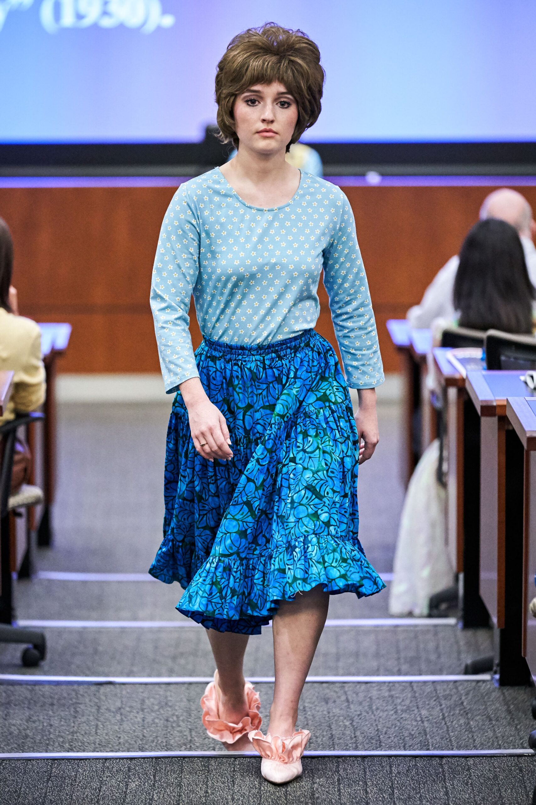 blue polka-dot top and flared skirt