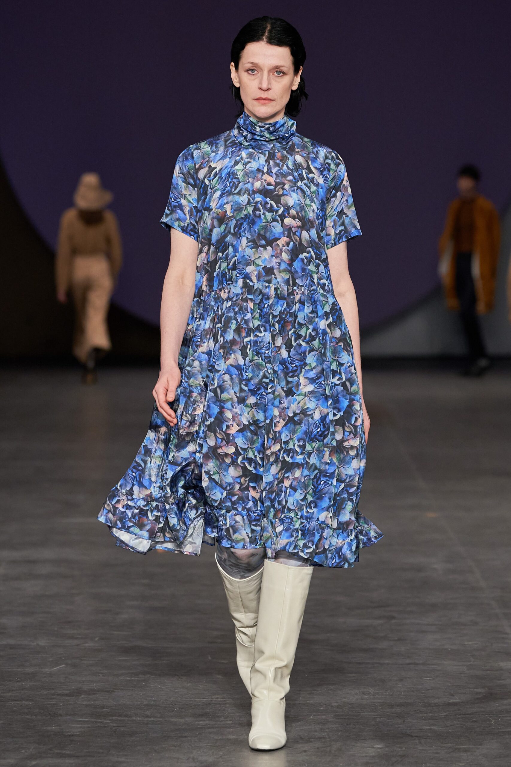 blue floral midi dress with white boots