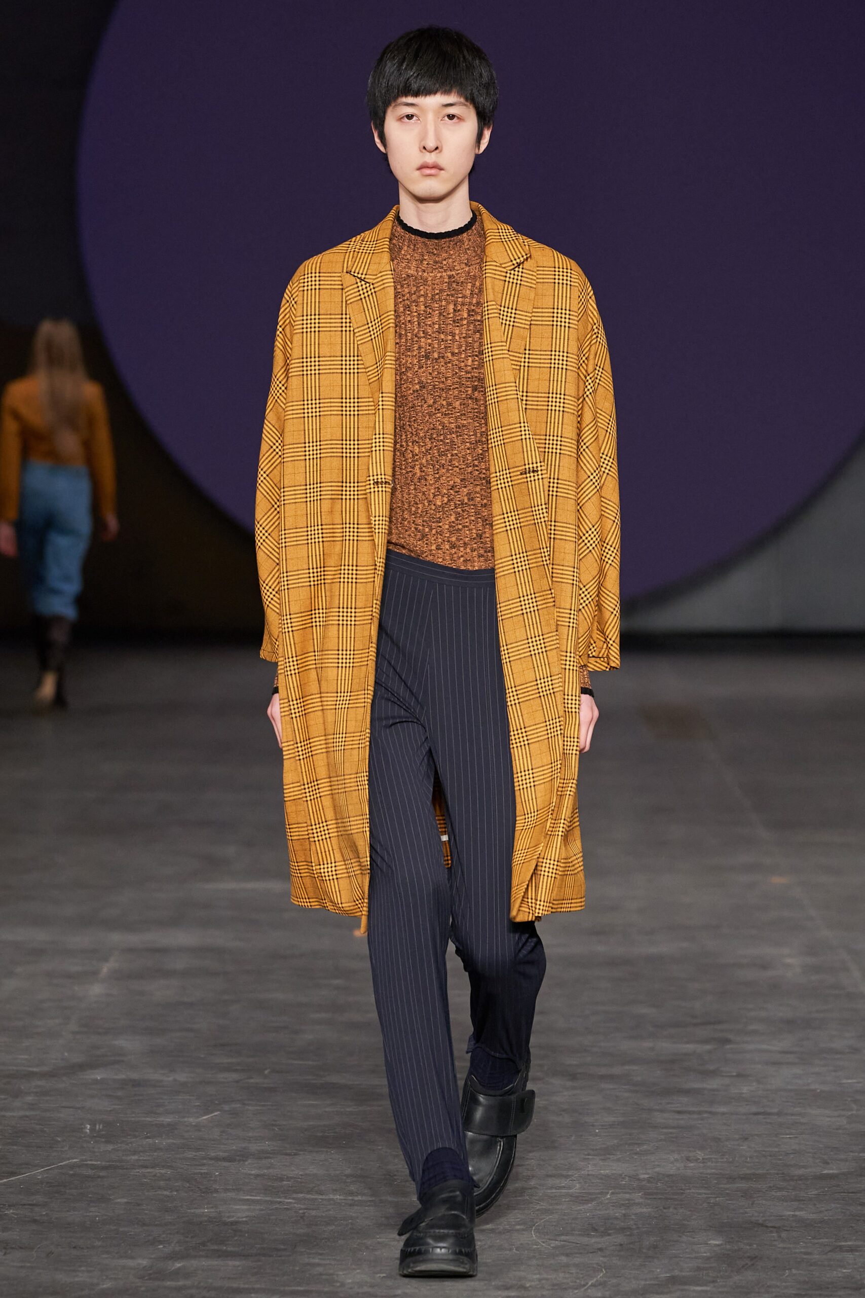 relaxed orange checked coat with fitted brown top
