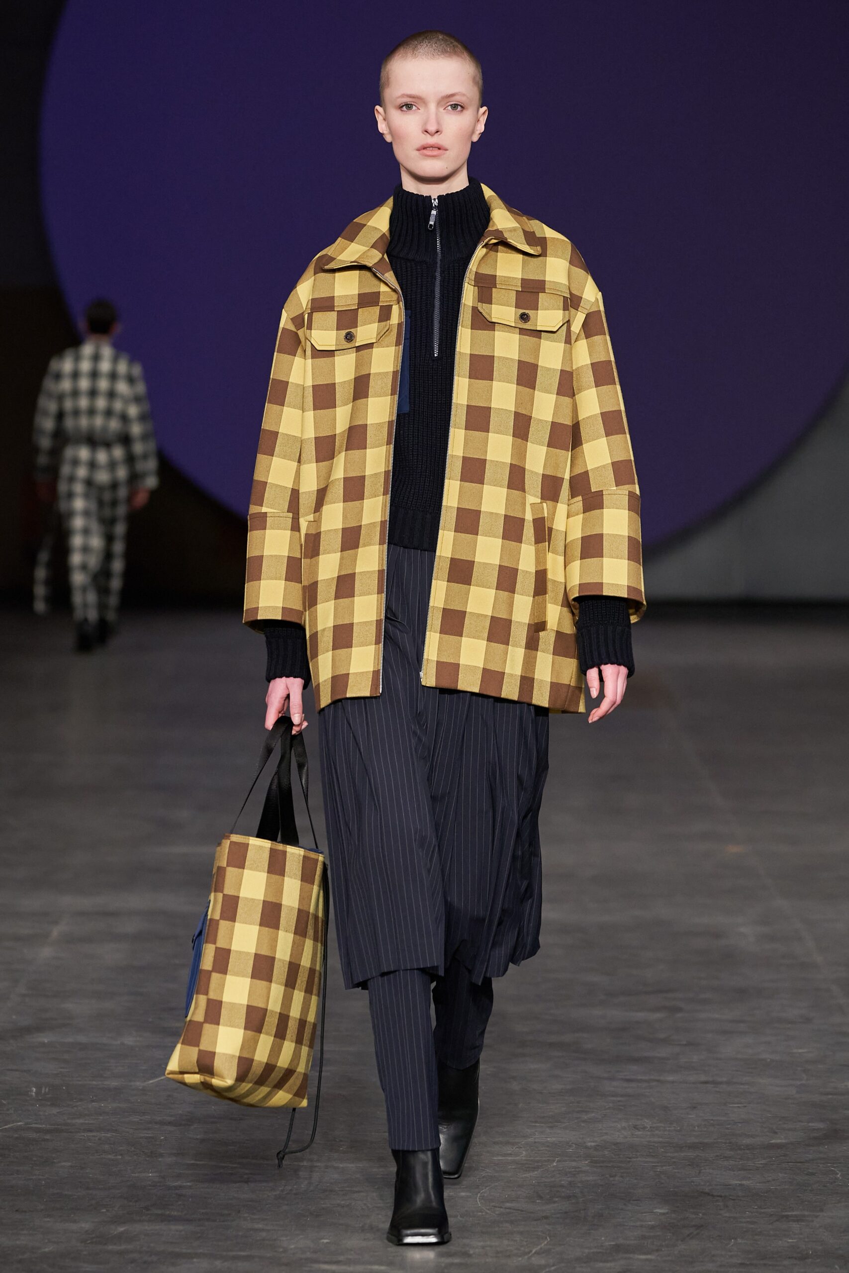 yellow brown checked jacket with black top