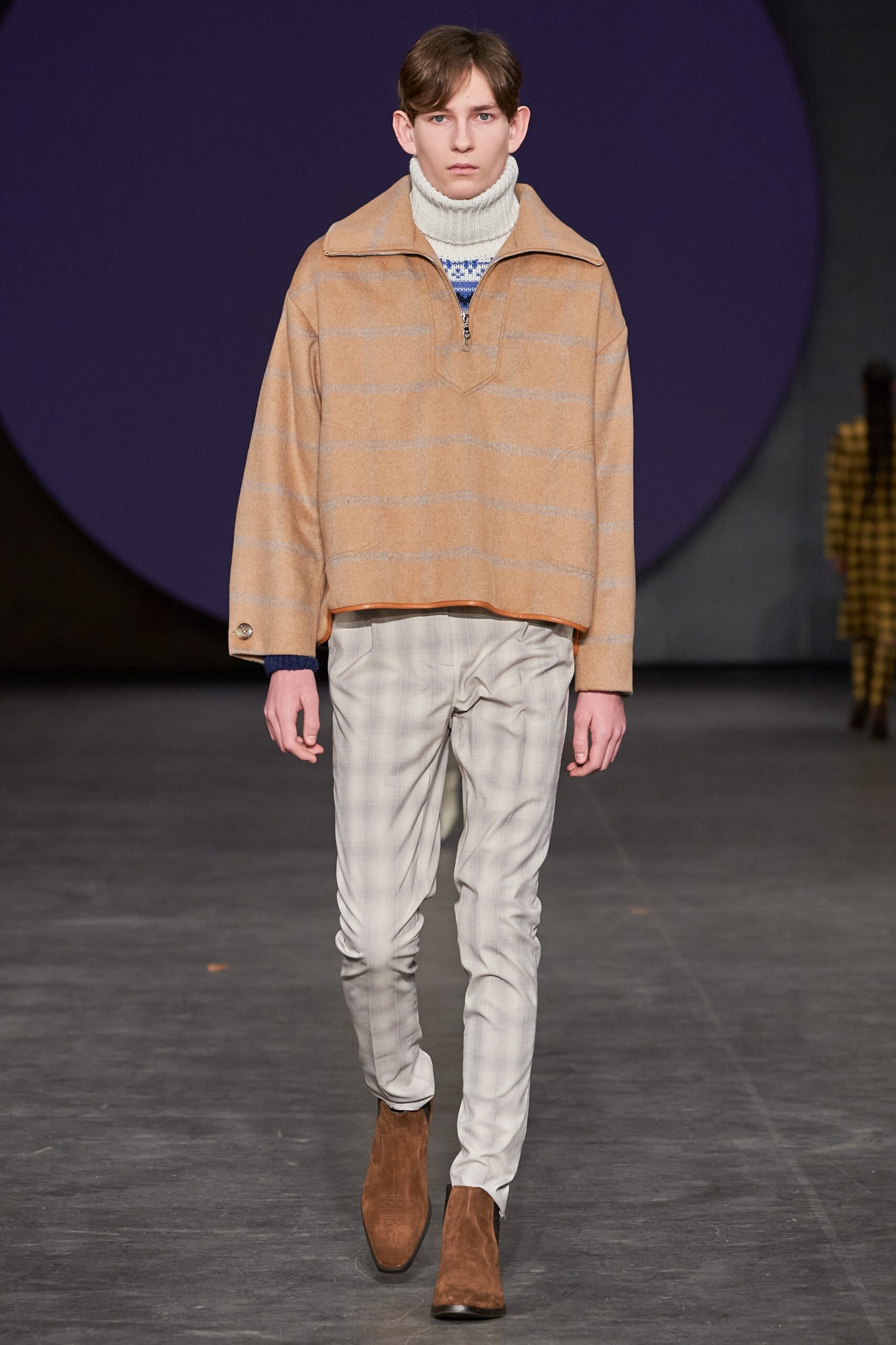 beige striped sweater with checked pants