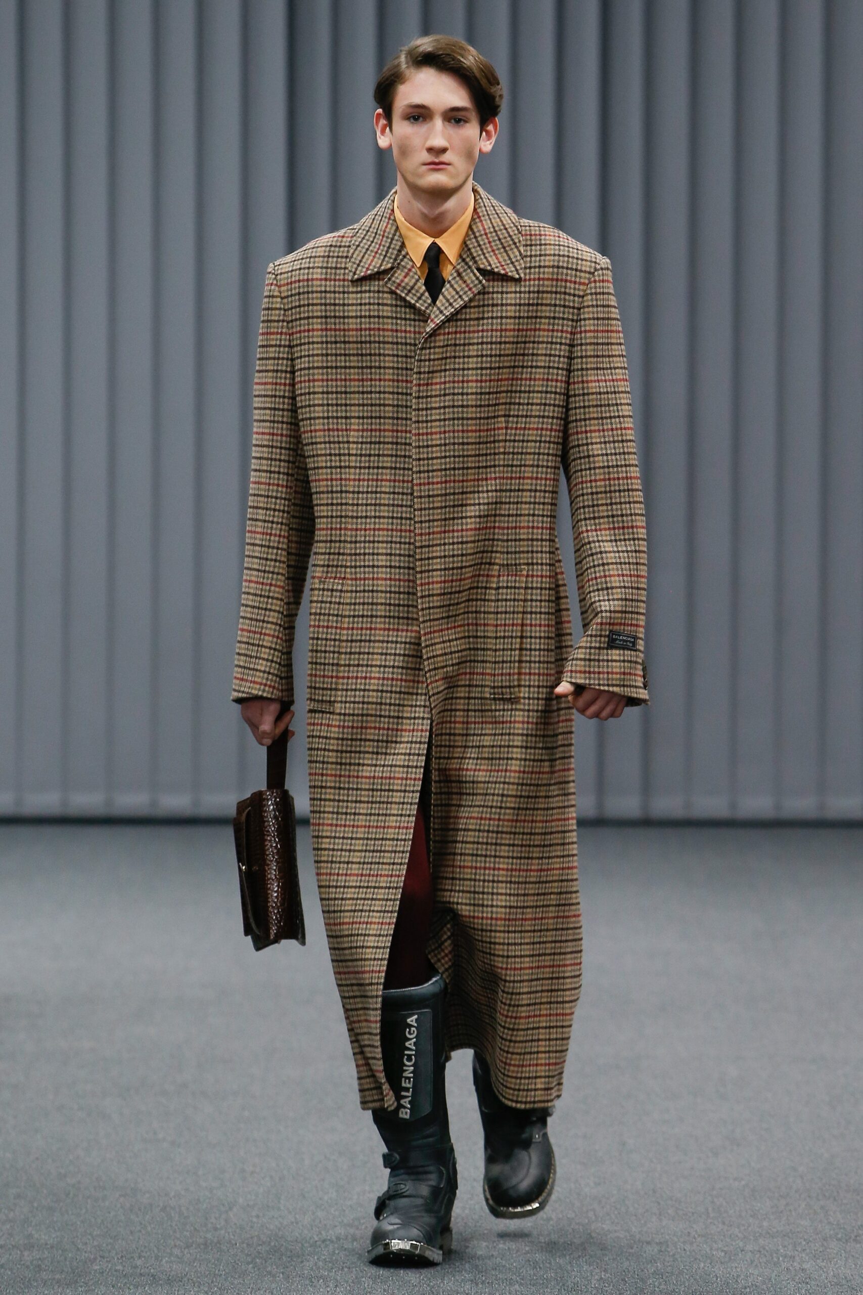 brown checked coat with yellow shirt
