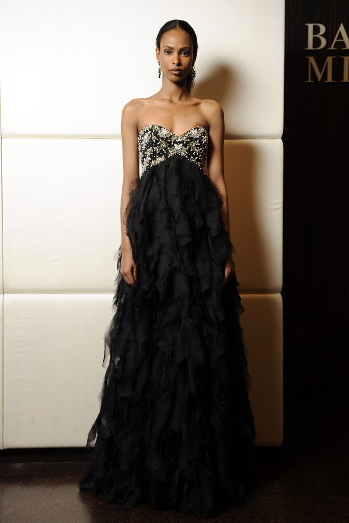 black ruffled strapless gown