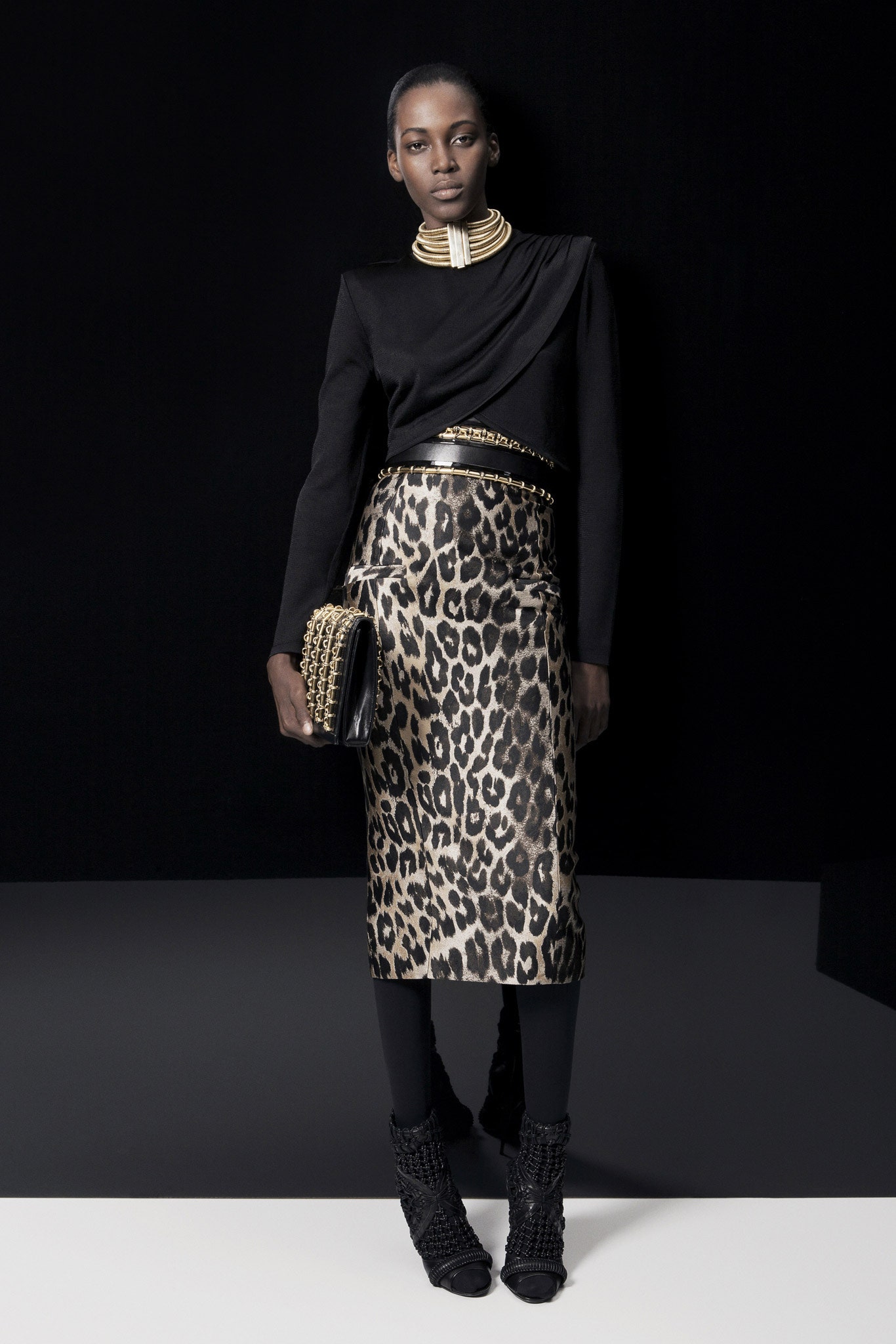 black fitted top with leopard skirt