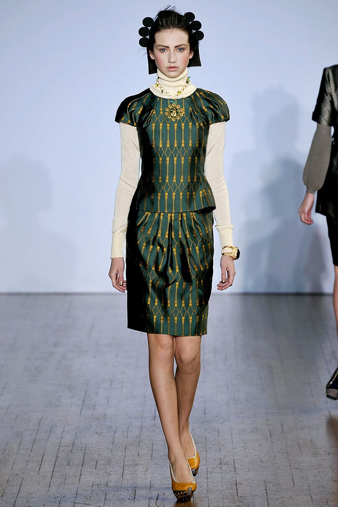 green and gold pleated dress
