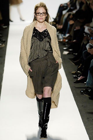 beige knit cardigan with black blouse