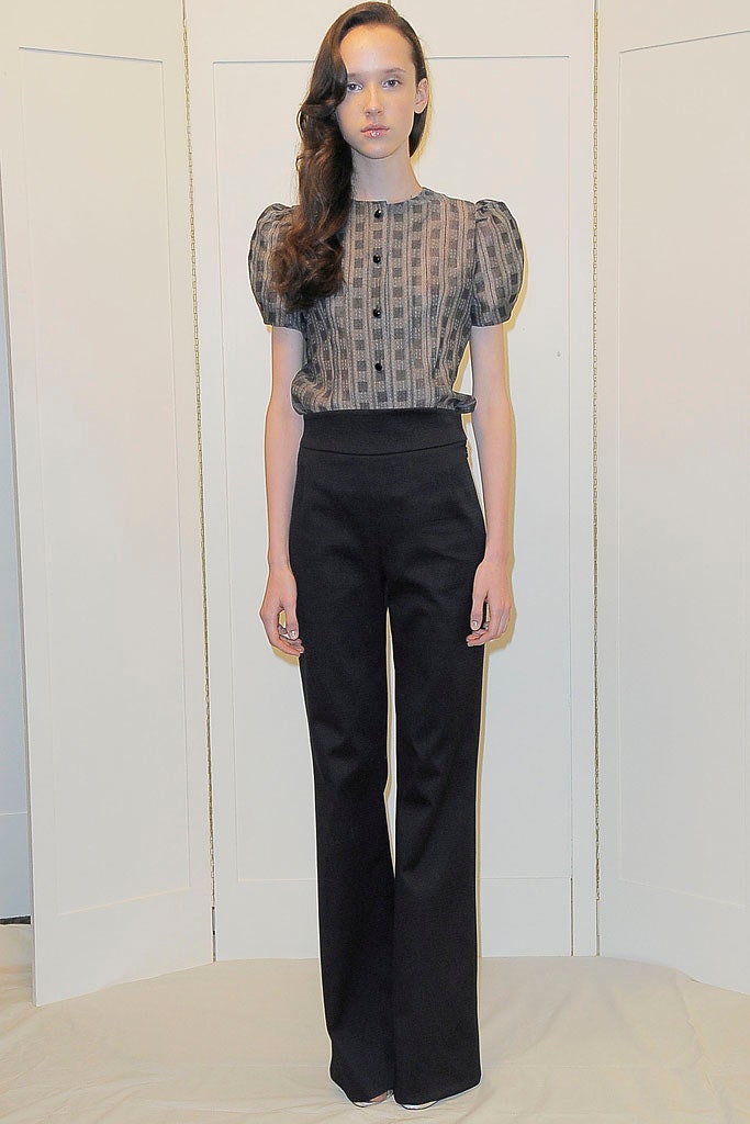 black and white pleated blouse with tailored pants