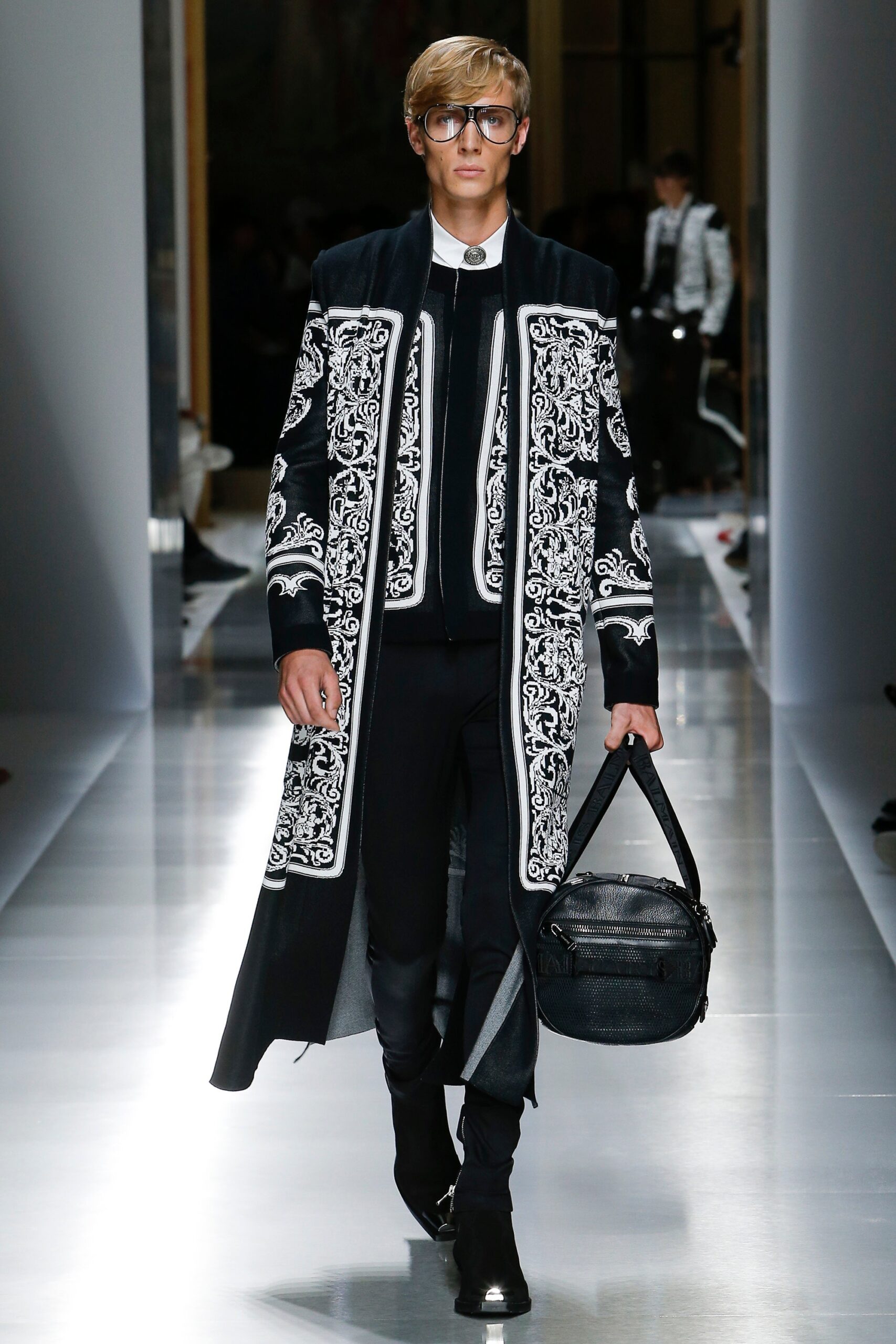 black embroidered coat with slim pants