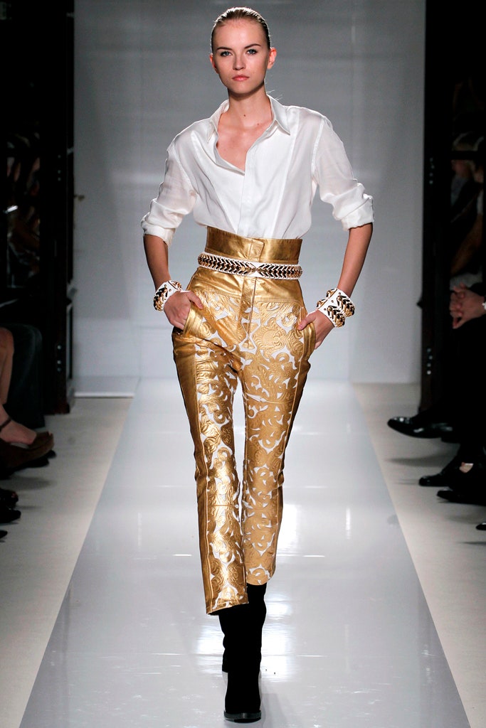 white fitted shirt gold pants