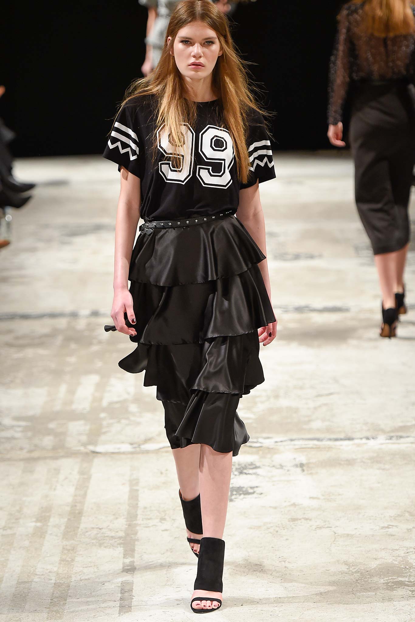 black fitted top and tiered skirt