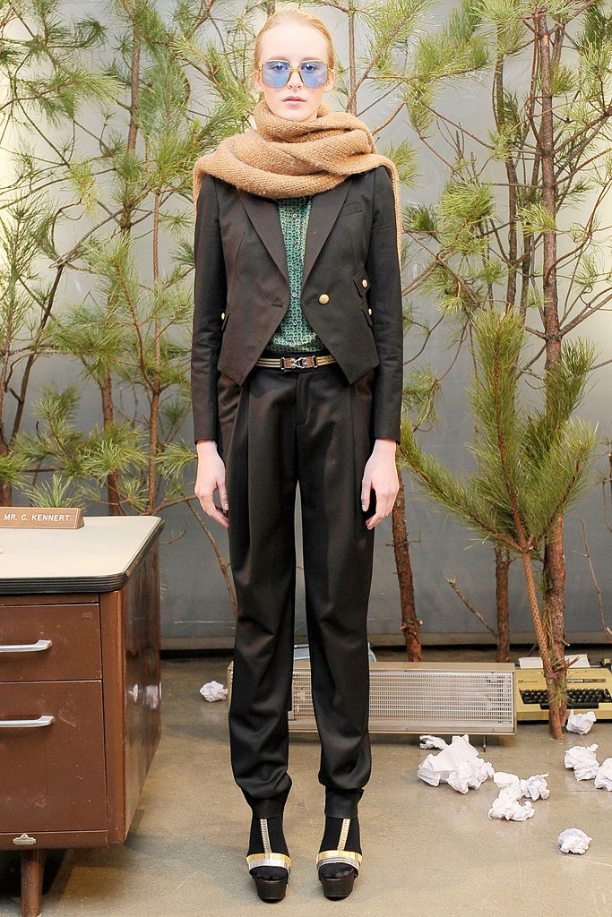 black tailored blazer with green top