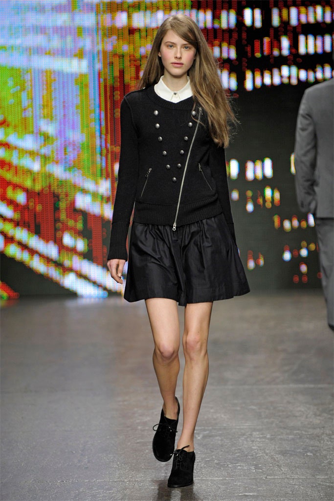 black fitted top and pleated skirt