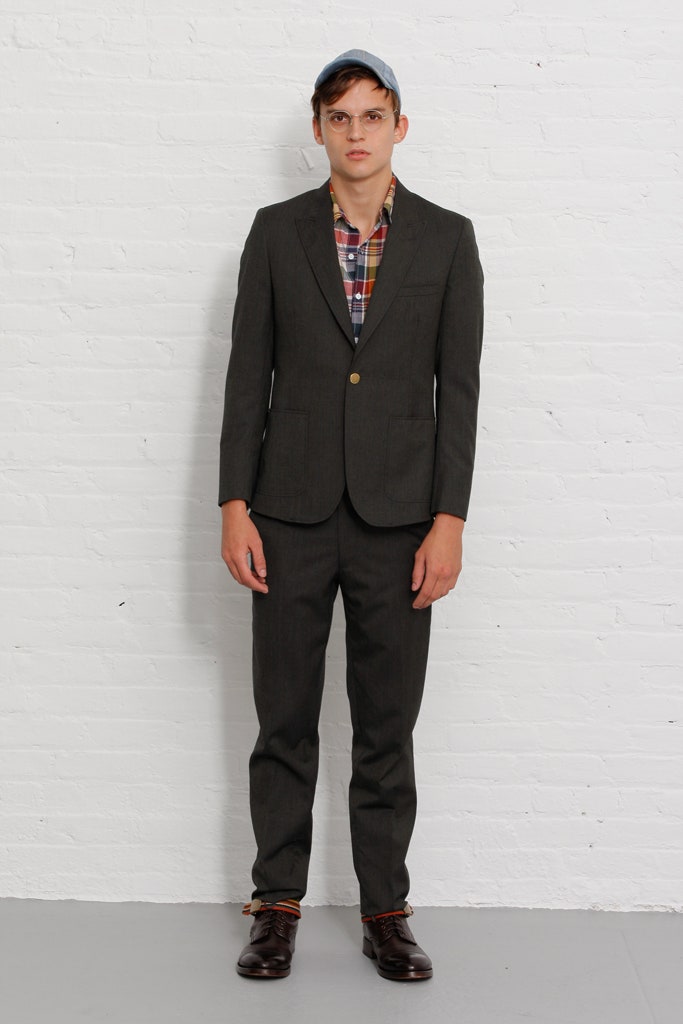 gray tailored suit with checked shirt