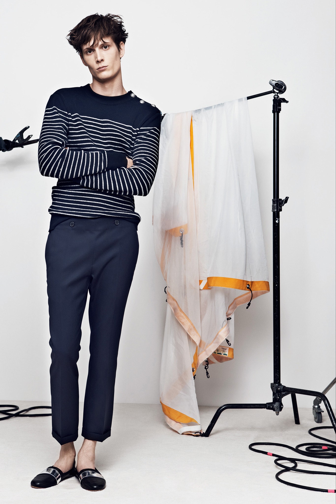 black and white striped fitted sweater with tailored pants