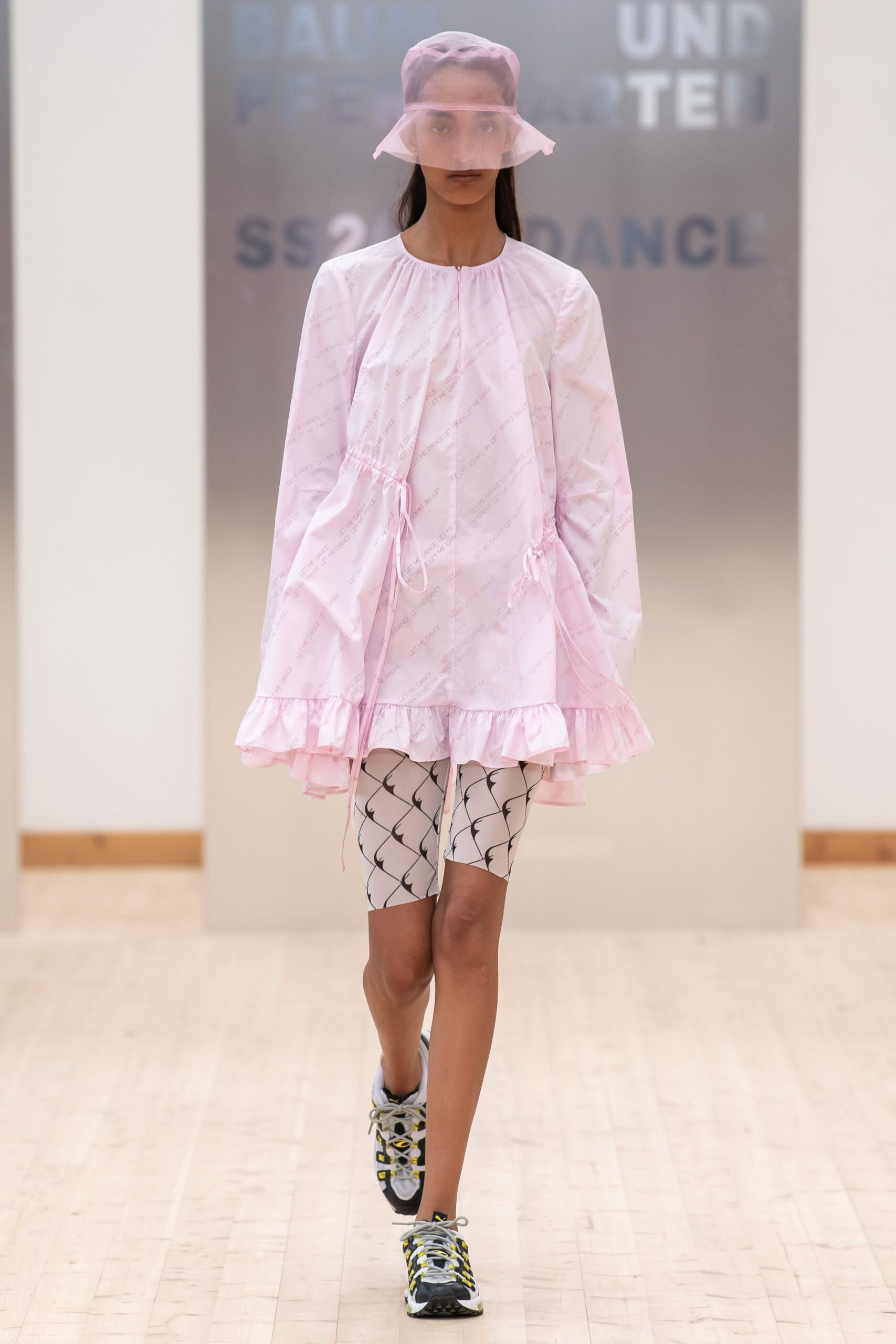 pink relaxed dress with printed shorts