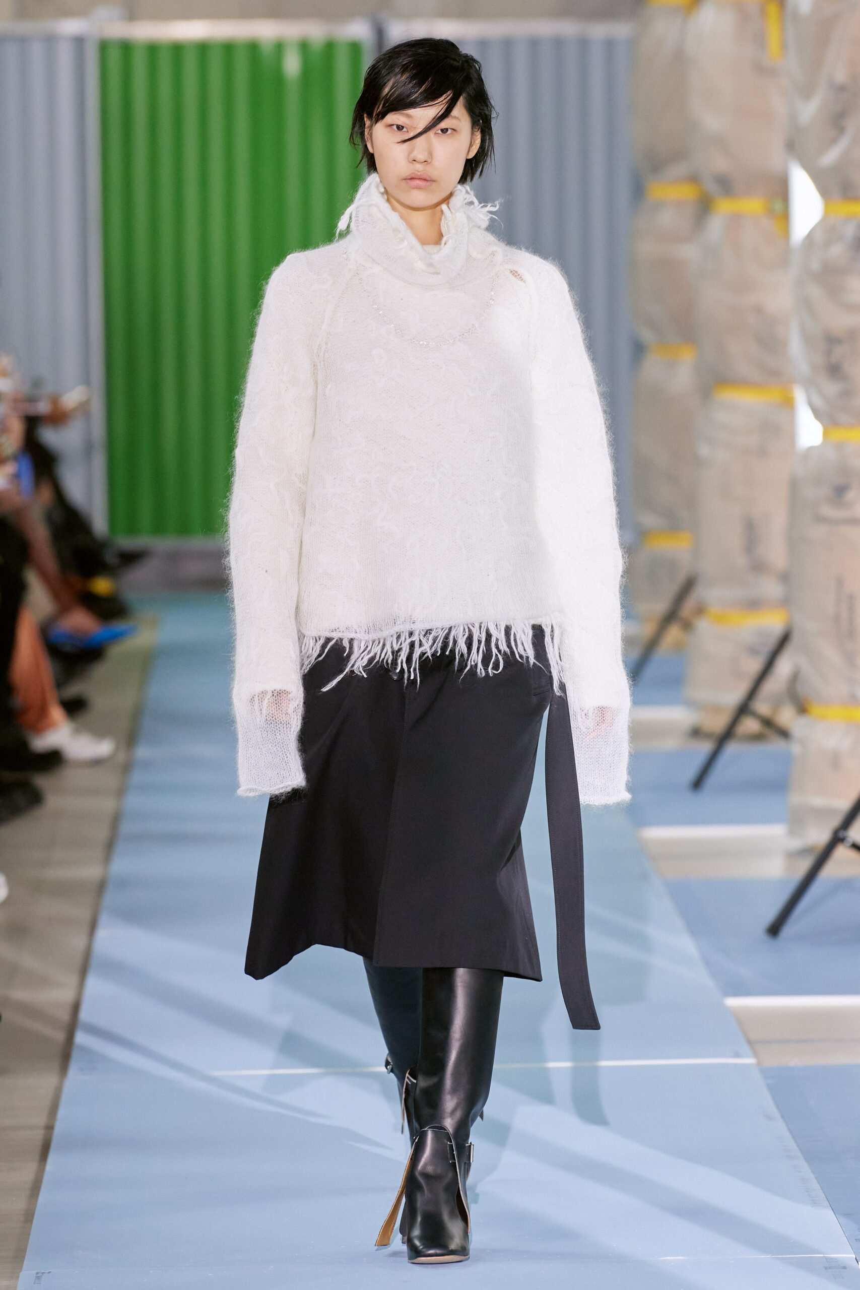 white fringed turtleneck knit sweater