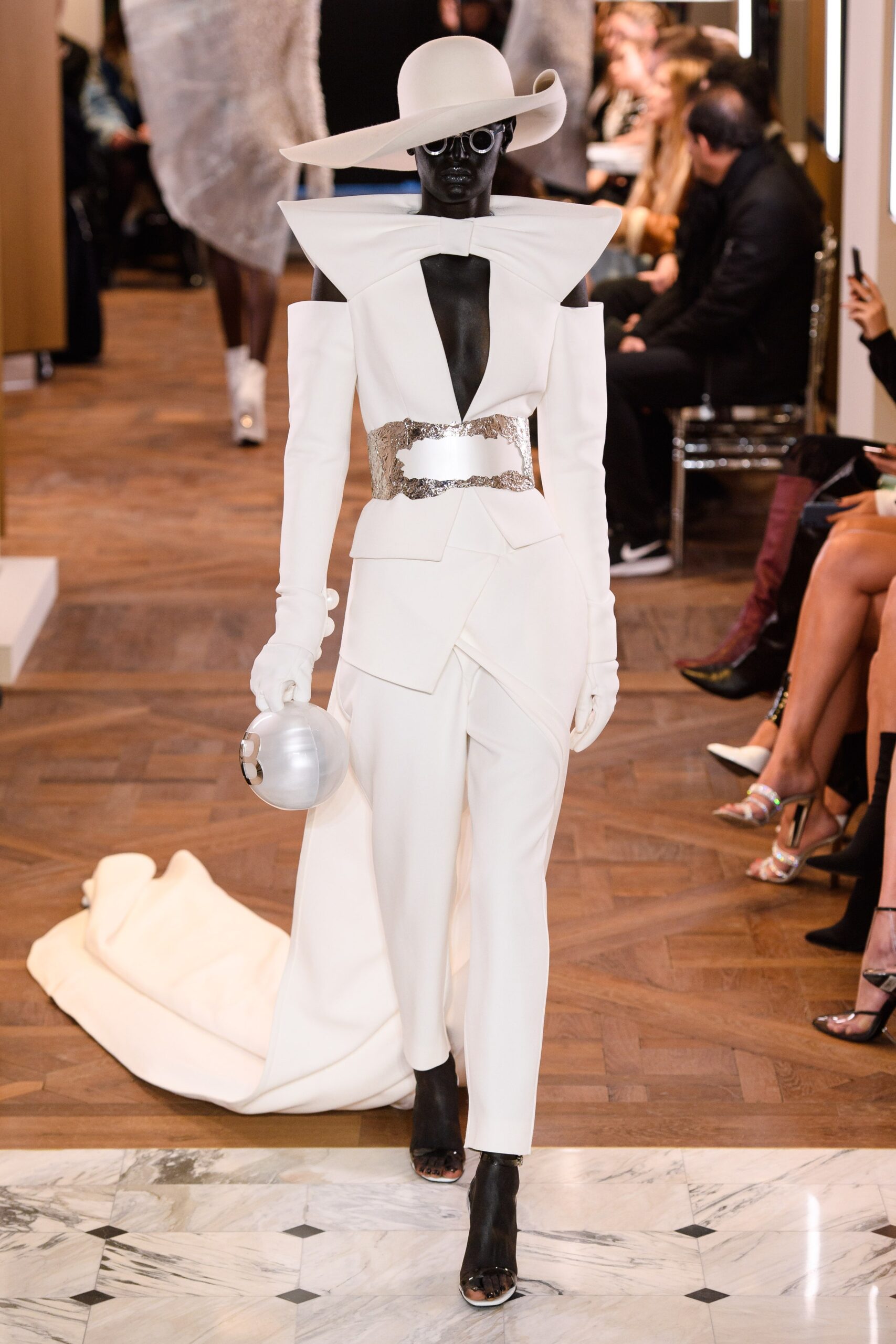 white tailored suit with accessories