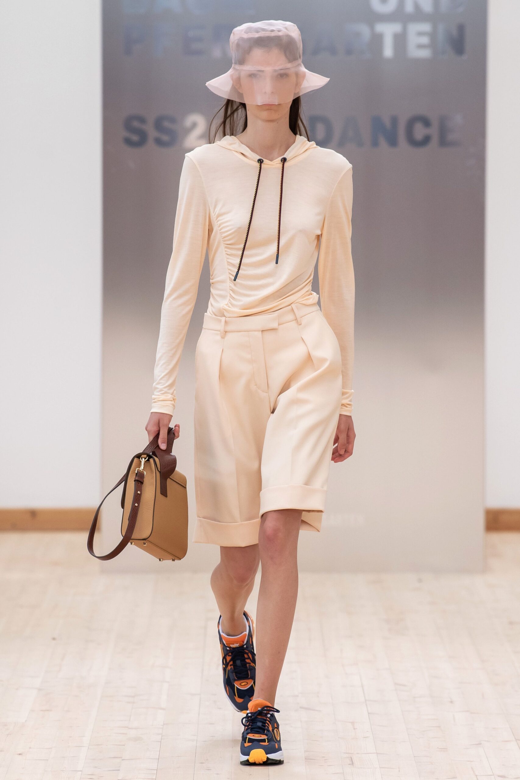 beige fitted top and shorts