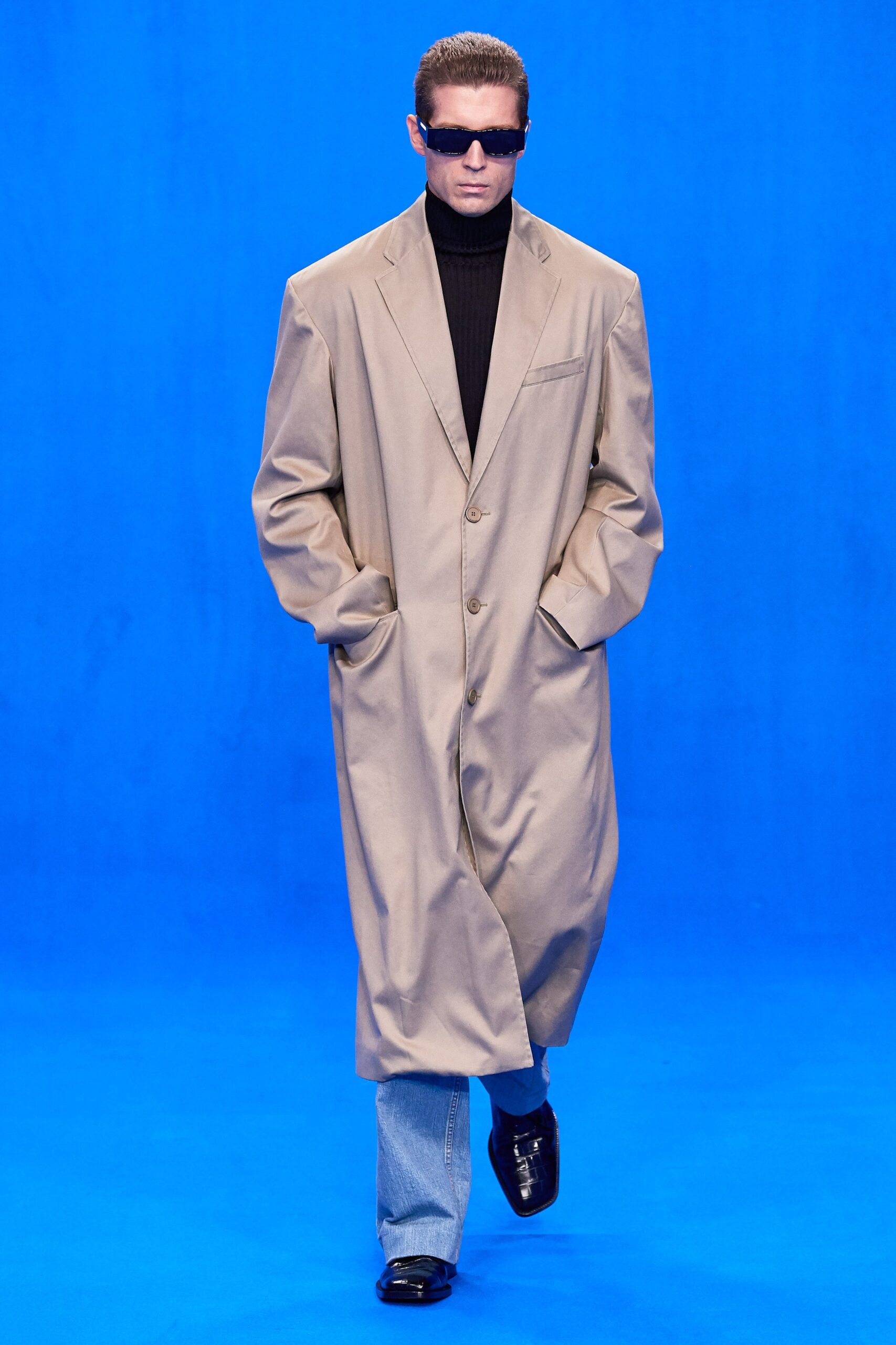 beige oversized coat with black turtleneck