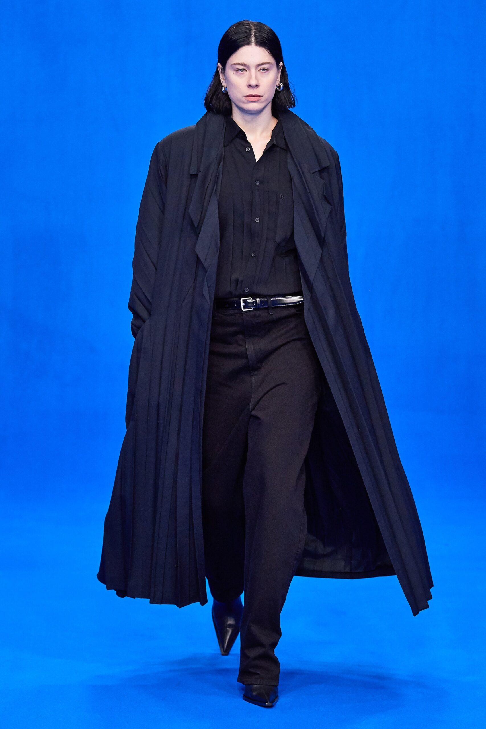 black relaxed coat with fitted shirt