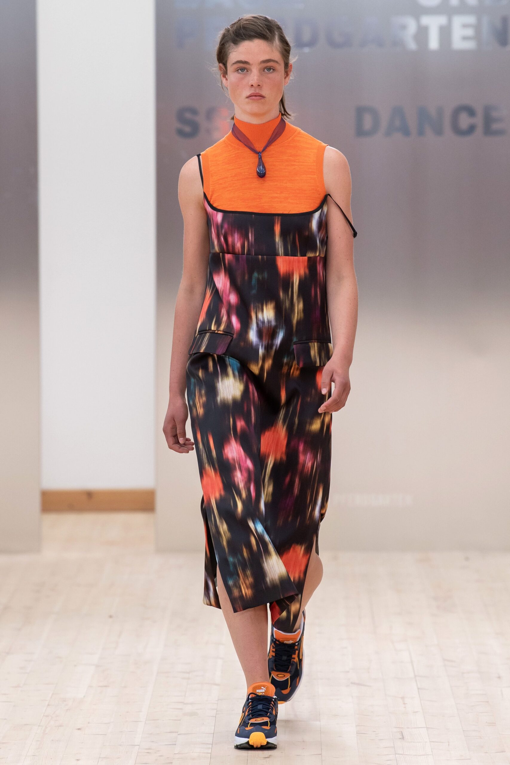 black and orange printed midi dress