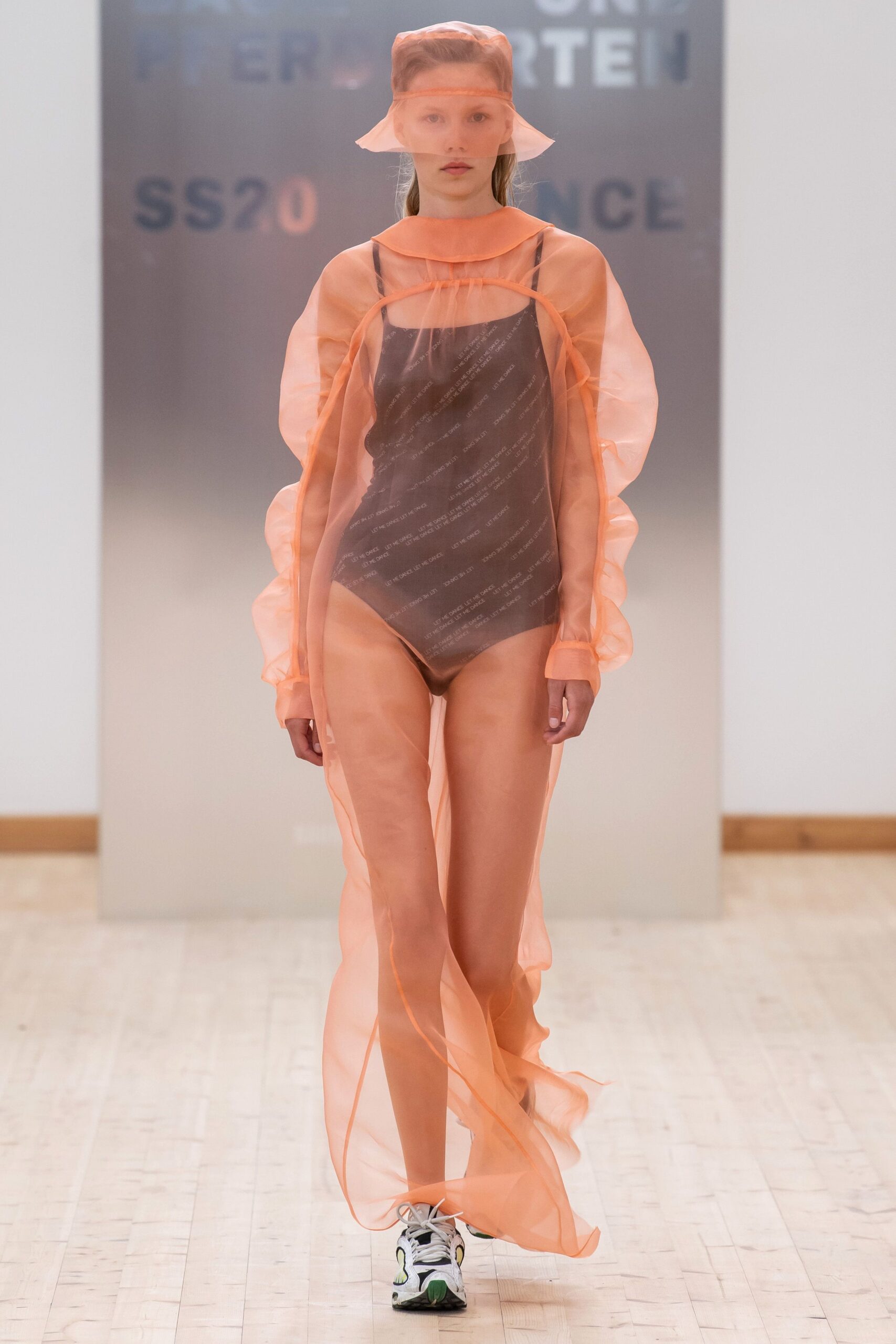 brown swimsuit with sheer orange coat