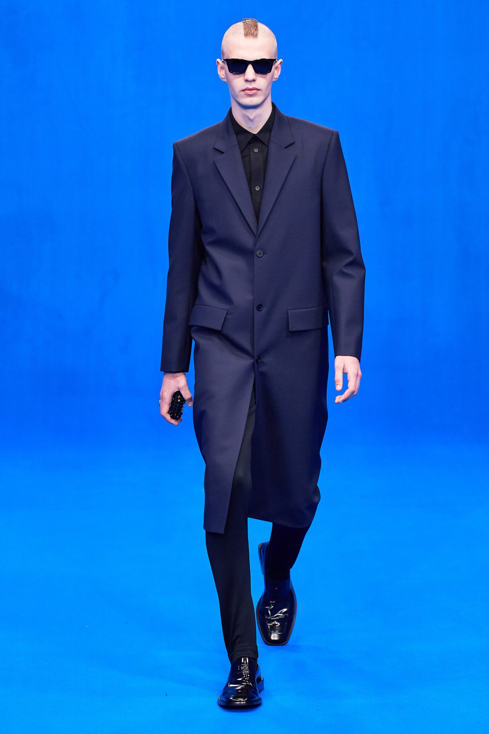 blue tailored blazer with black pants