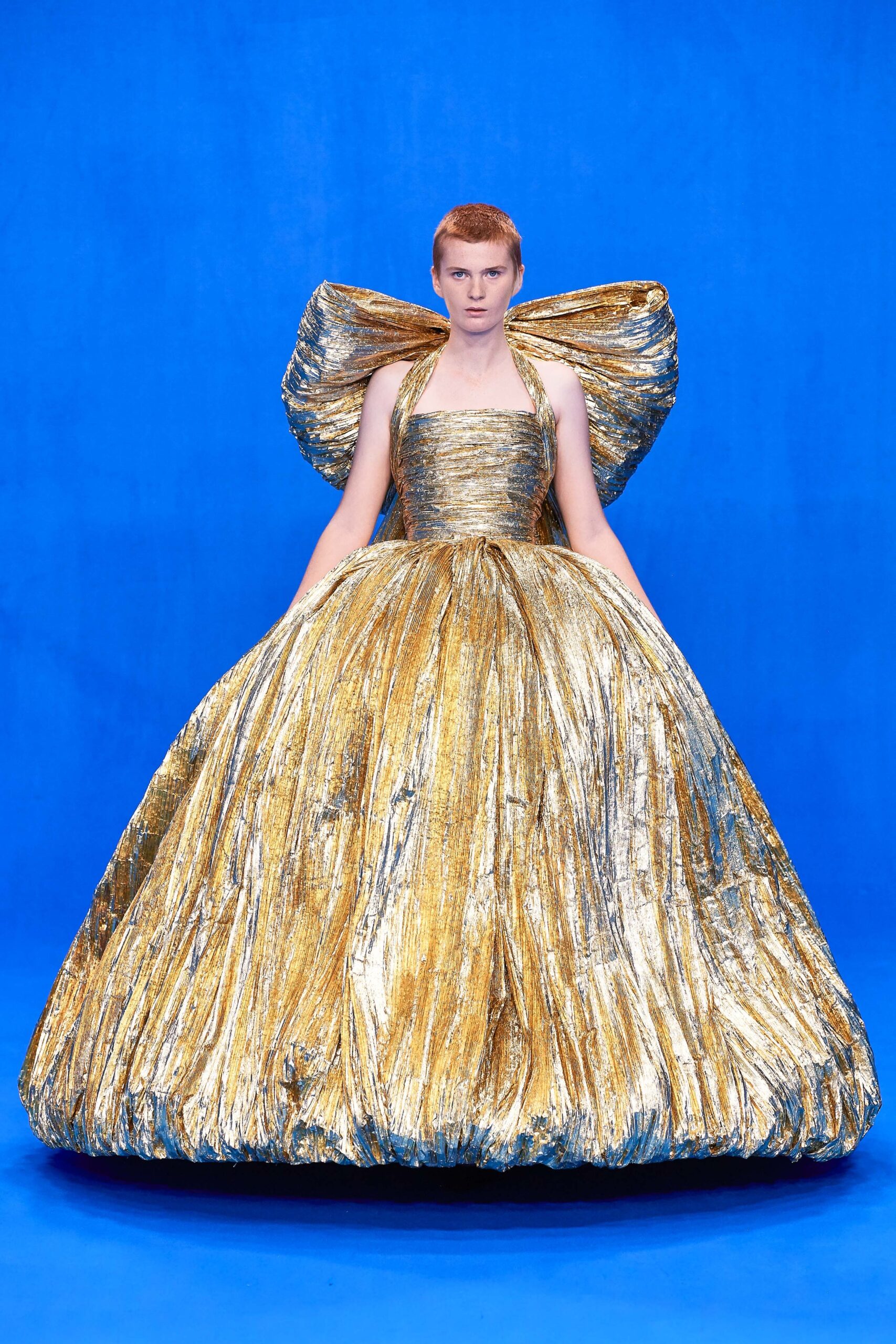 gold pleated halter gown