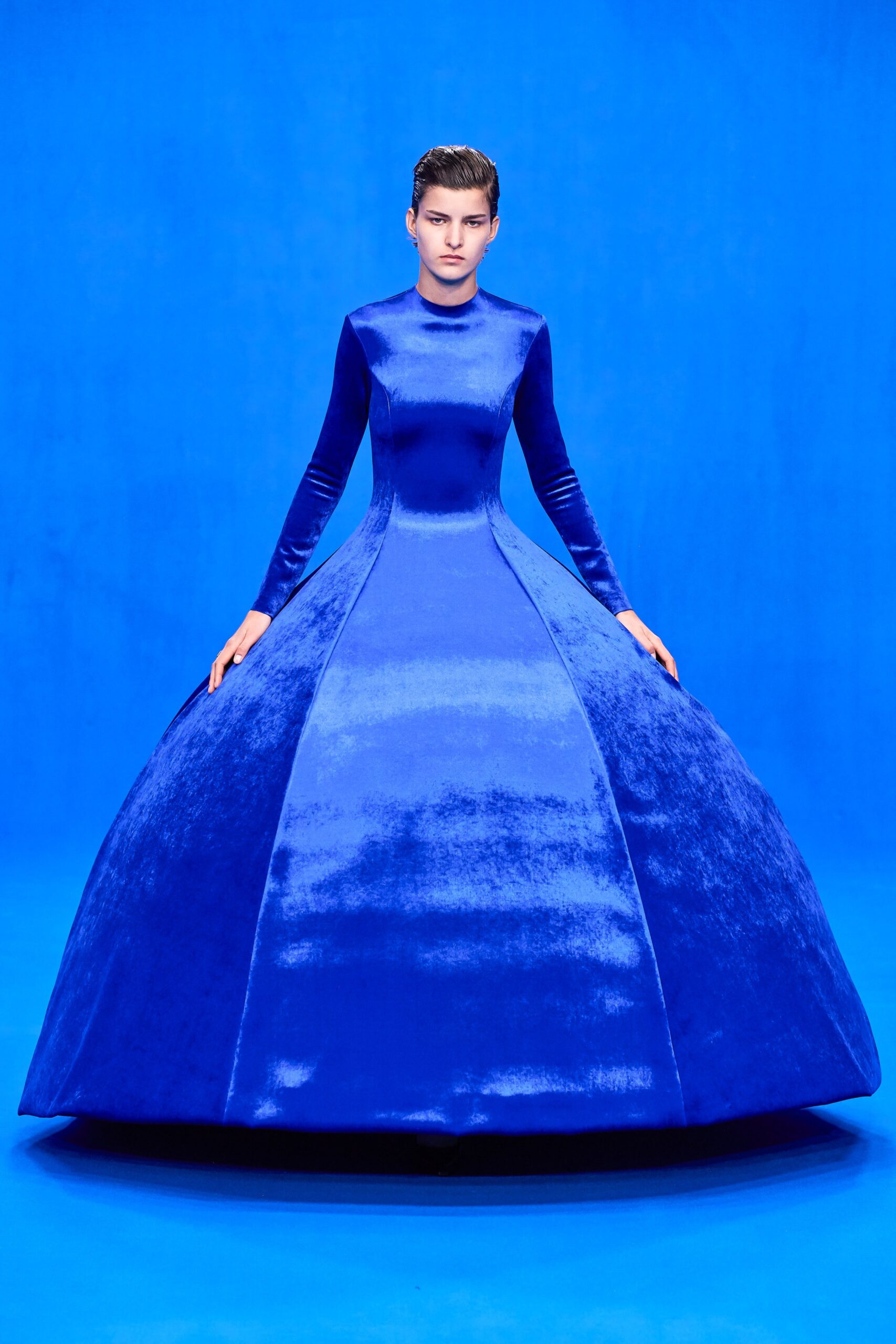 blue velvet long-sleeve gown